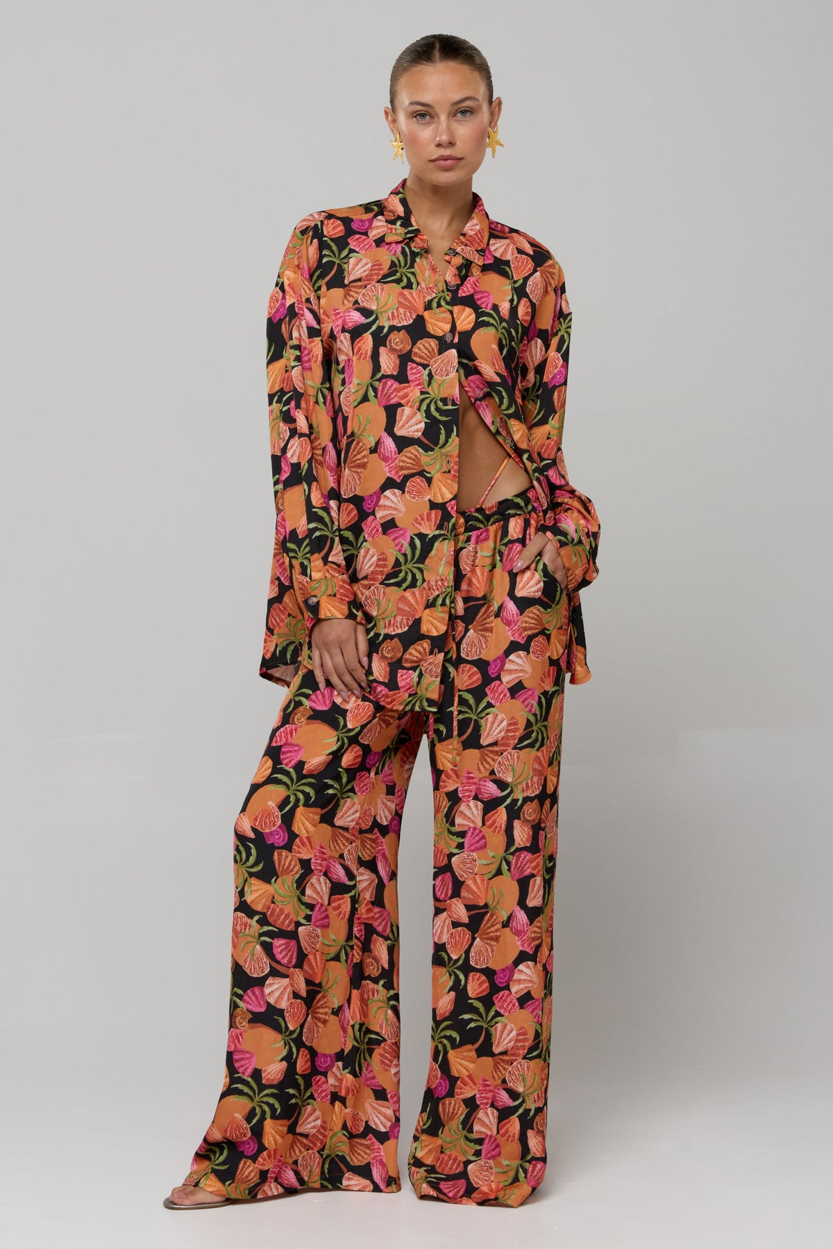 This is an image of Miley Set in Conch - RESA featuring a model wearing the dress