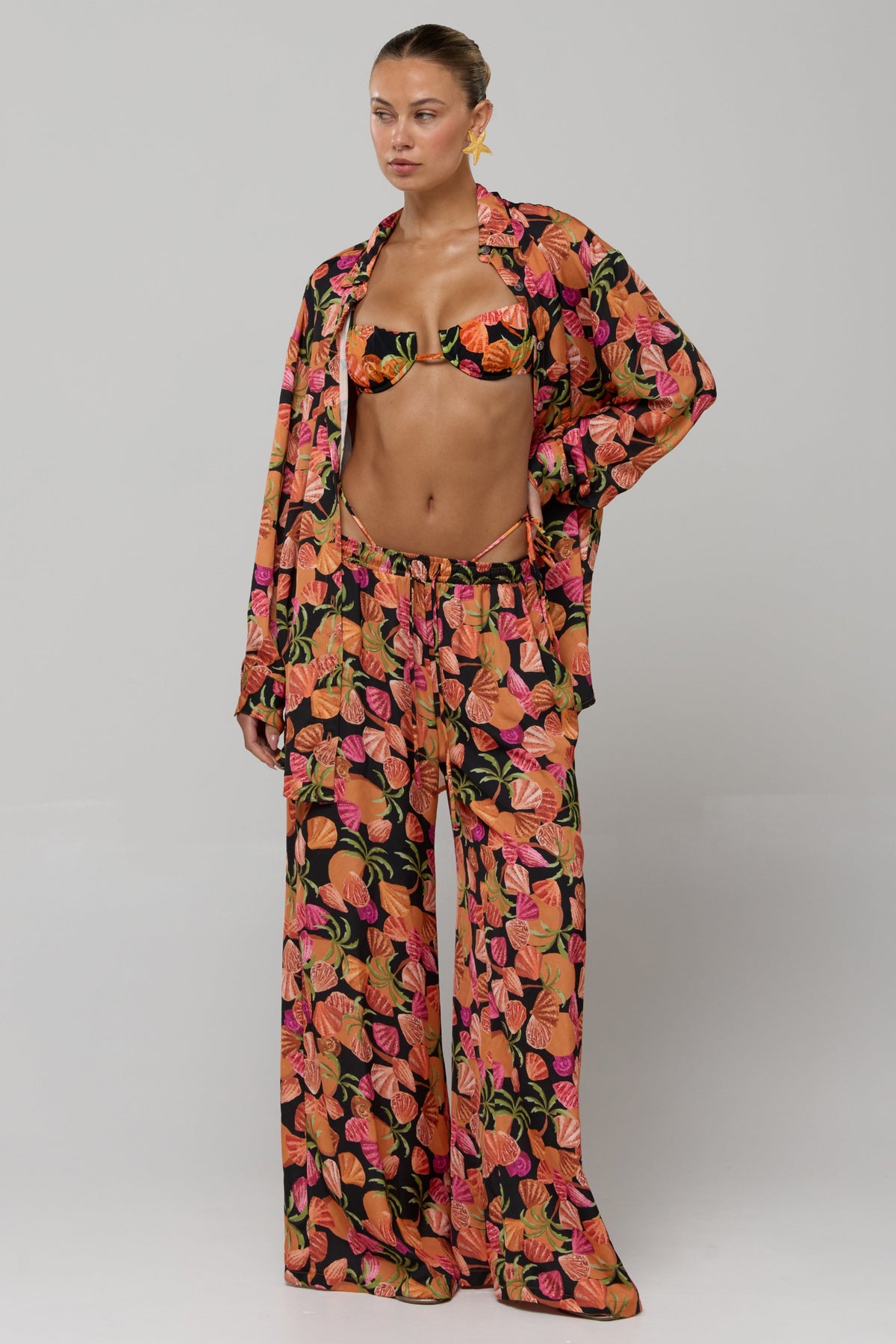 This is an image of Miley Set in Conch - RESA featuring a model wearing the dress