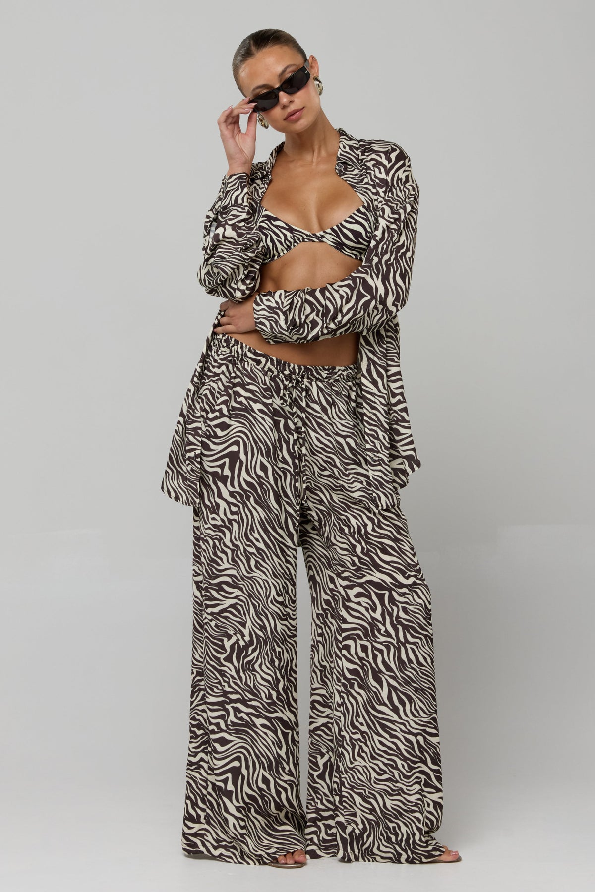 This is an image of Miley Set in Selva - RESA featuring a model wearing the dress