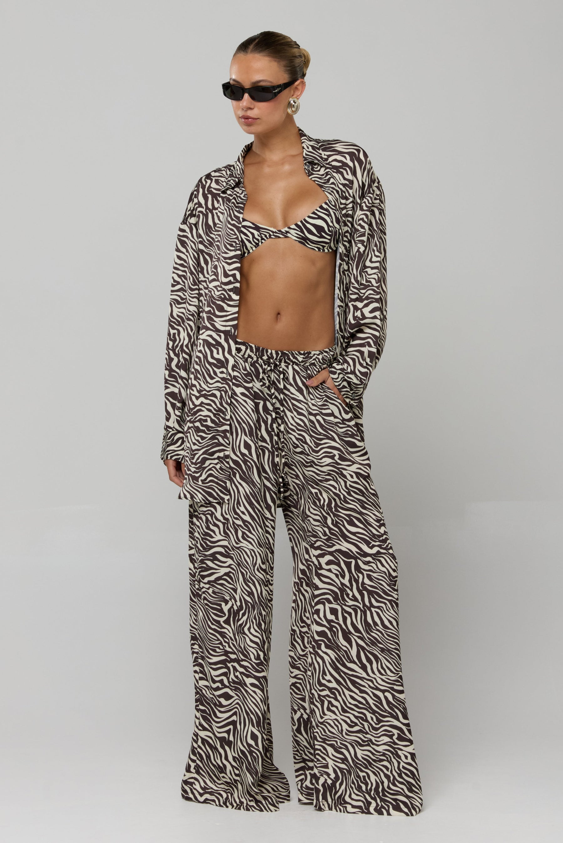 This is an image of Miley Set in Selva - RESA featuring a model wearing the dress