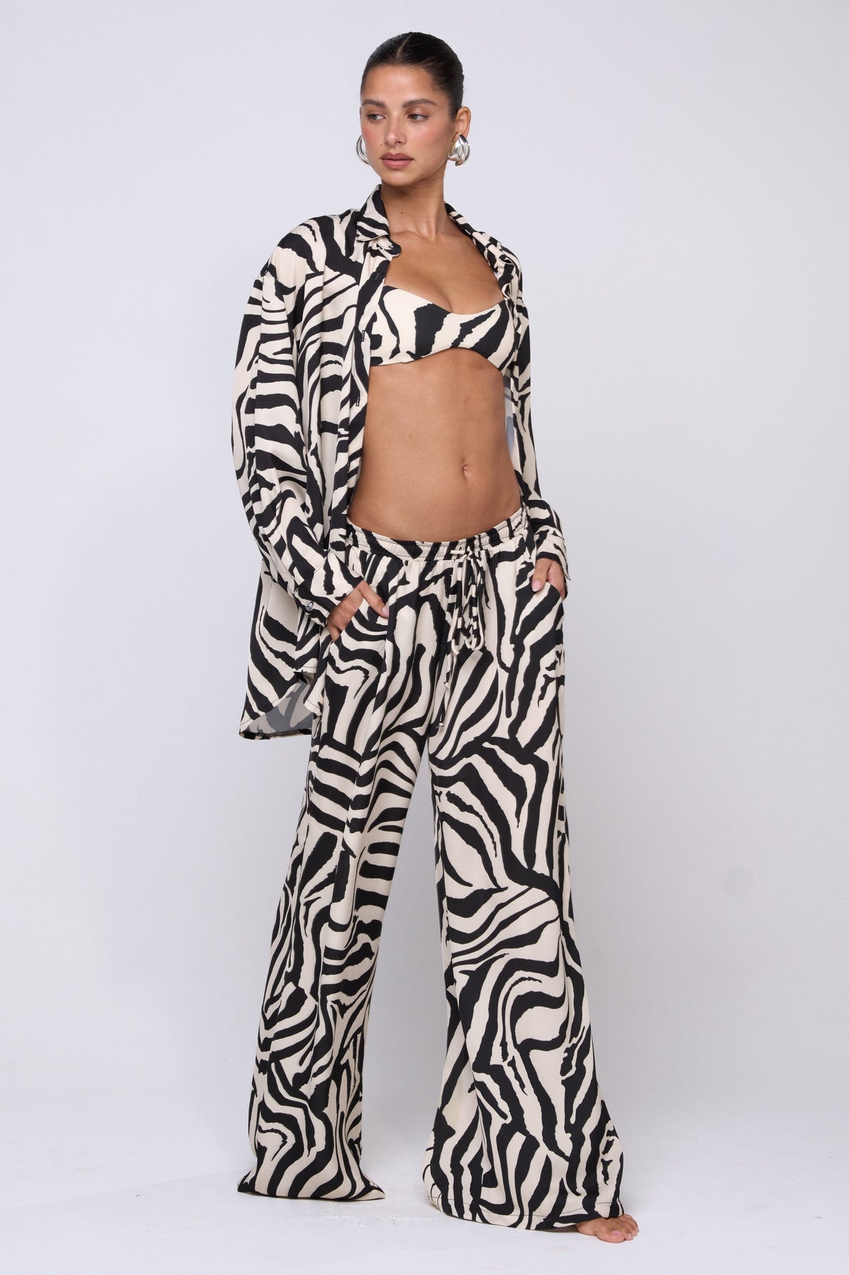 This is an image of Miley Set in Tigris - RESA featuring a model wearing the dress