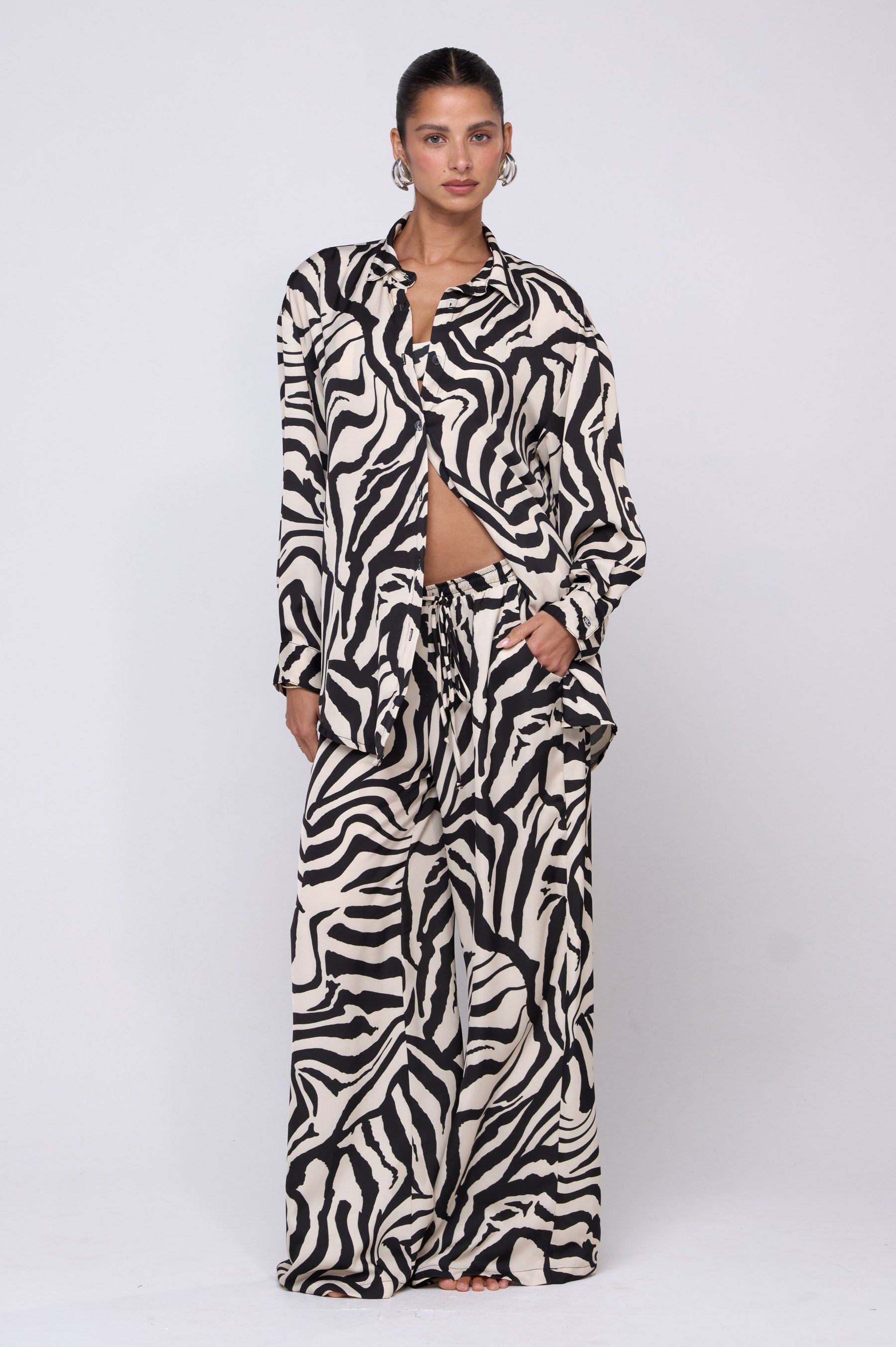 This is an image of Miley Set in Tigris - RESA featuring a model wearing the dress
