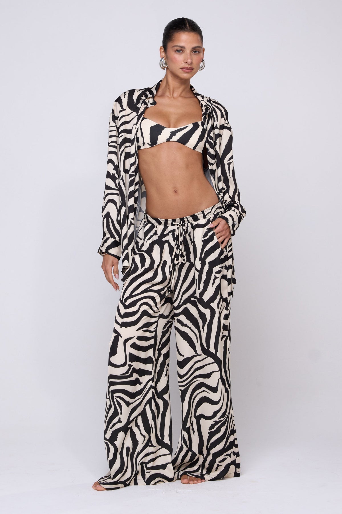 This is an image of Miley Set in Tigris - RESA featuring a model wearing the dress