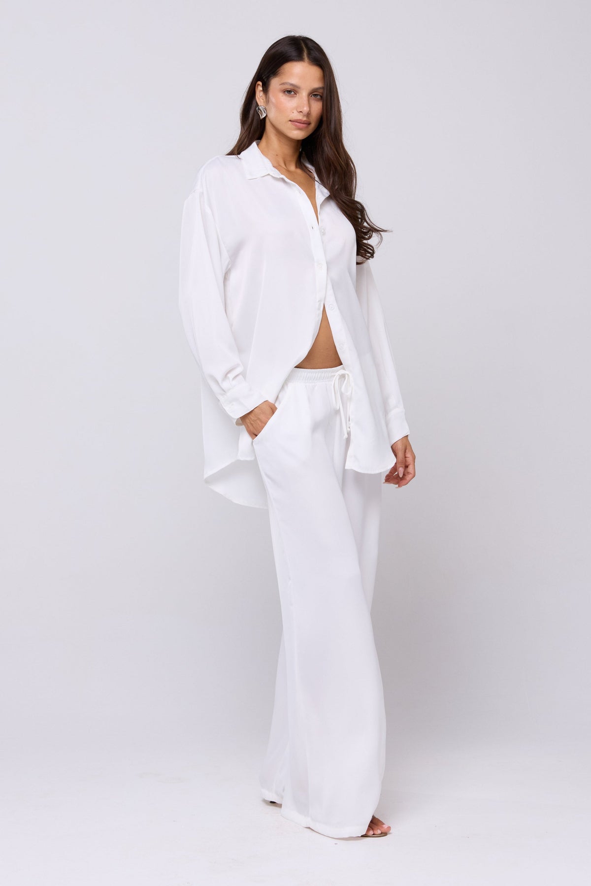 This is an image of Miley Set in White - RESA featuring a model wearing the dress