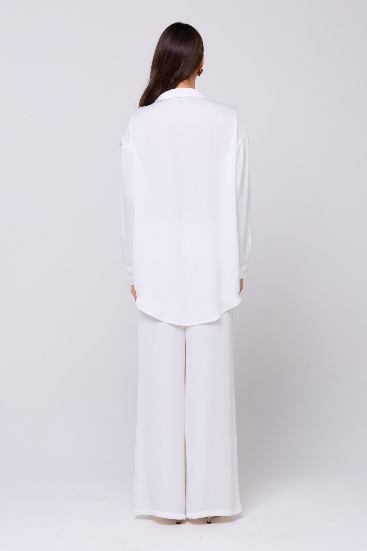 This is an image of Miley Set in White - RESA featuring a model wearing the dress