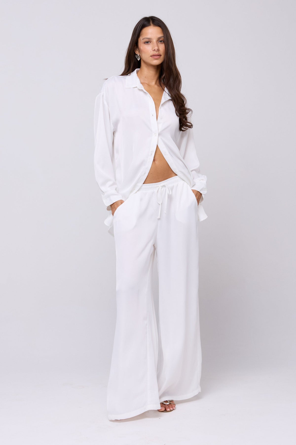 This is an image of Miley Set in White - RESA featuring a model wearing the dress