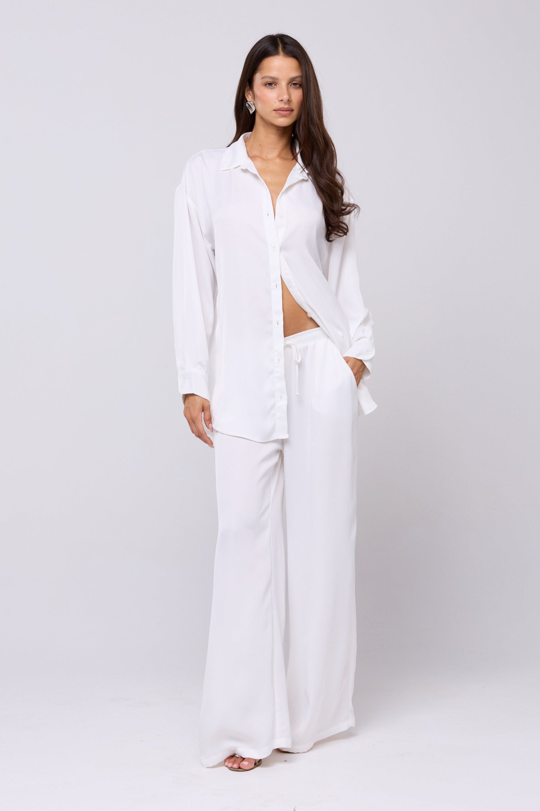 This is an image of Miley Set in White - RESA featuring a model wearing the dress