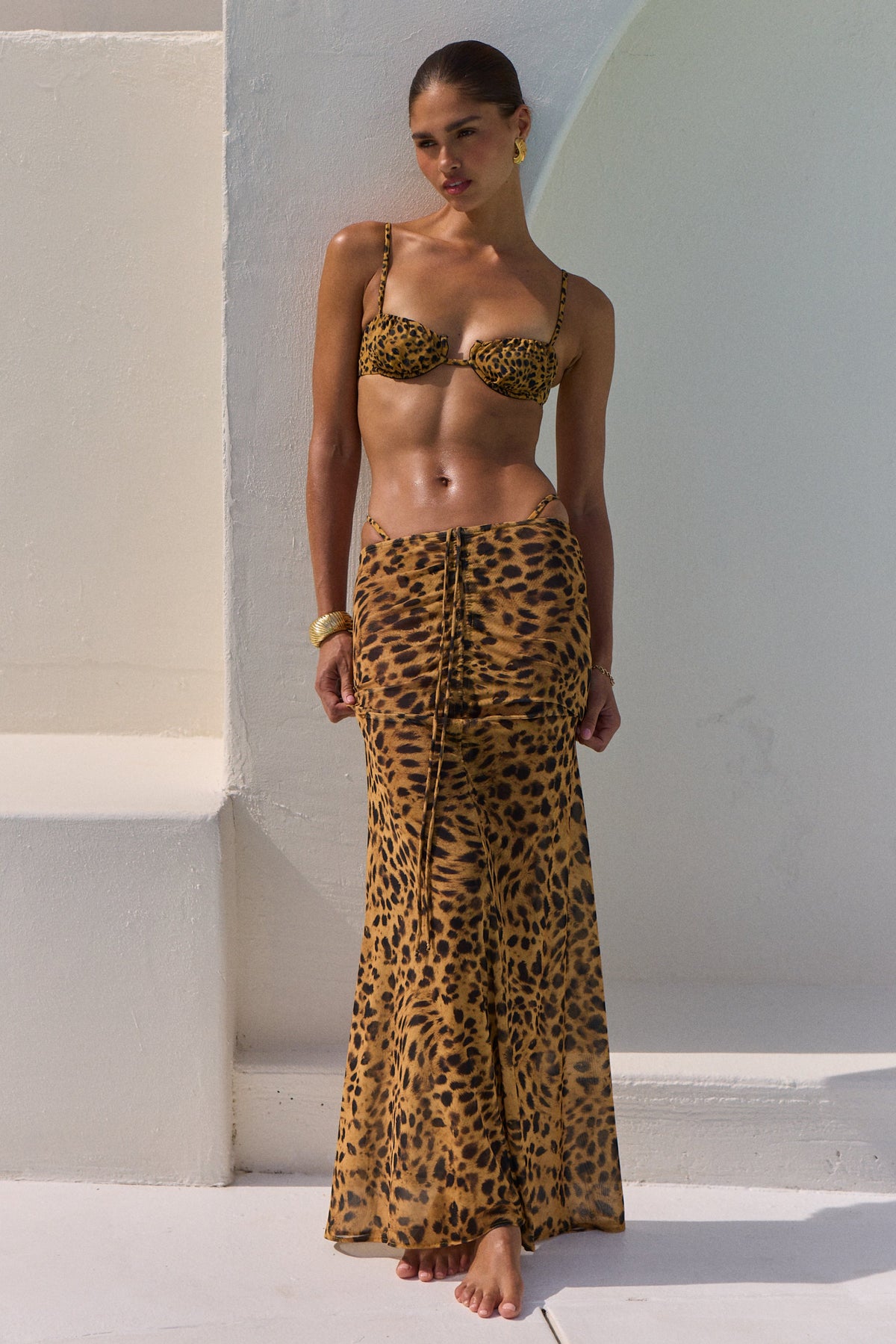 This is an image of Millie Bikini Top in 007 - RESA featuring a model wearing the dress
