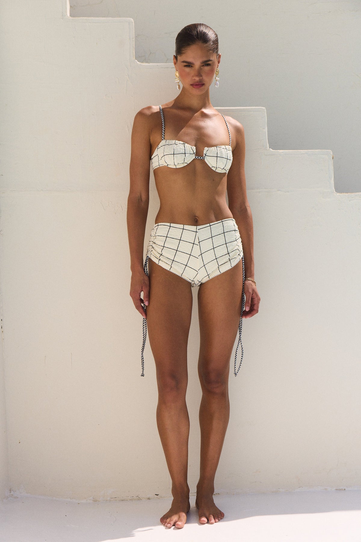 This is an image of Millie Bikini Top in Hampton - RESA featuring a model wearing the dress