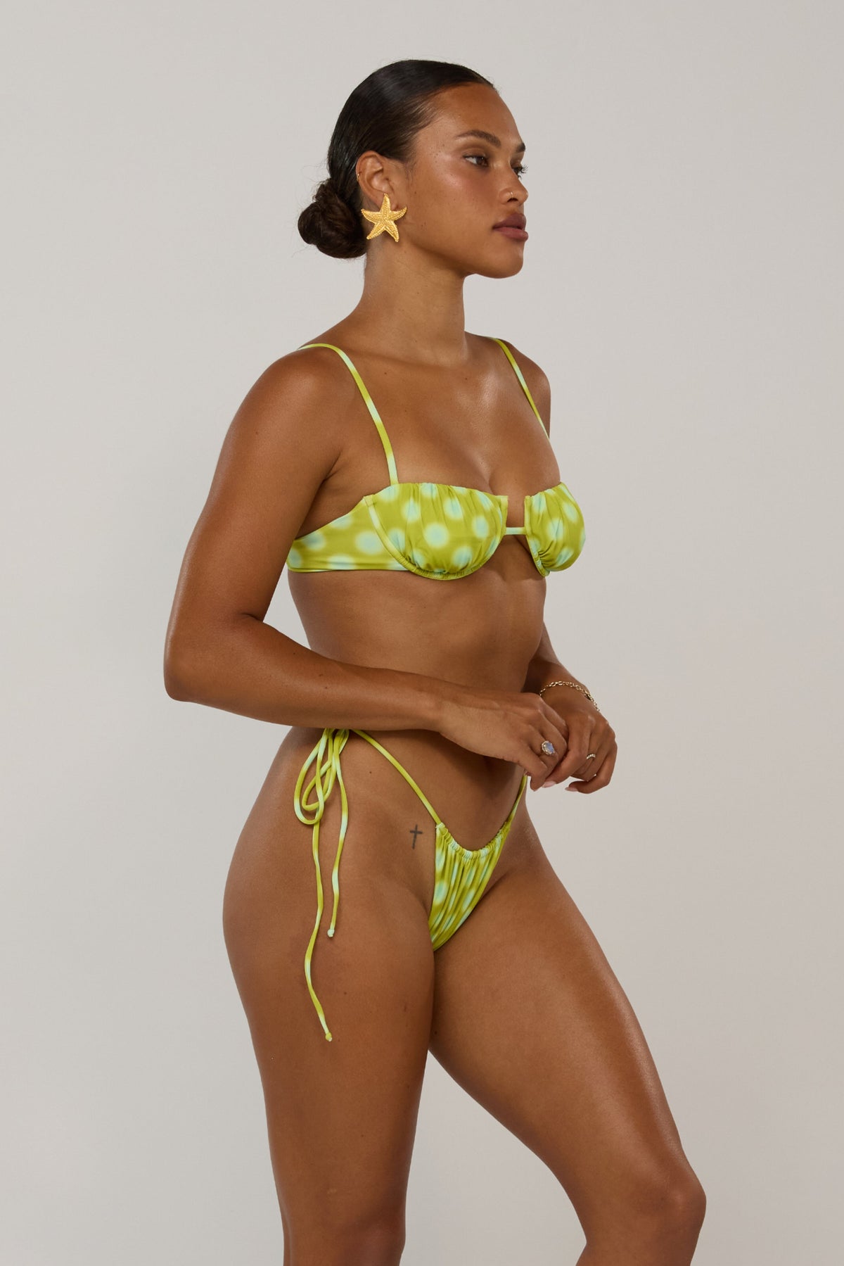 This is an image of Millie in Luma - RESA featuring a model wearing the dress