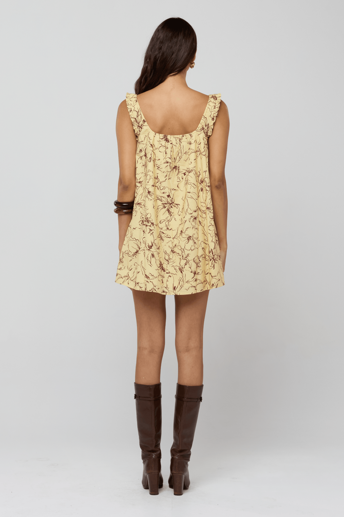This is an image of Mini Moo Dress in Butterscotch - RESA featuring a model wearing the dress