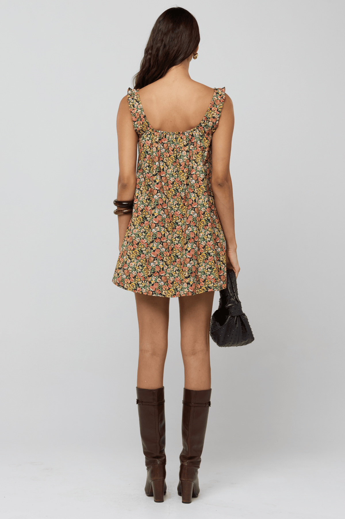 This is an image of Mini Moo Dress in Fig - RESA featuring a model wearing the dress