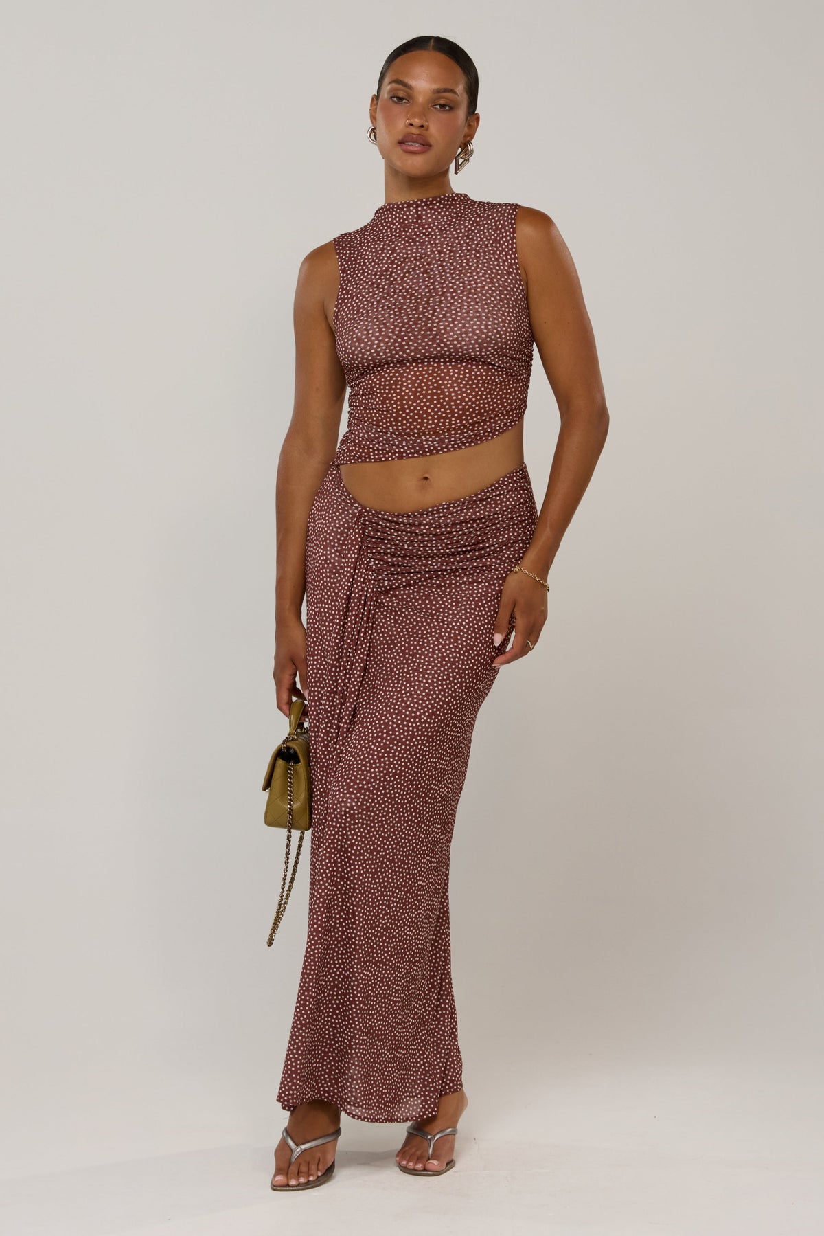 This is an image of Minka in Coco Vanilla - RESA featuring a model wearing the dress