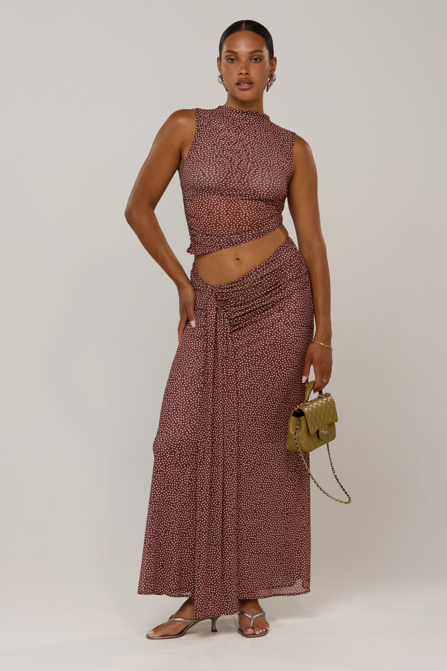 This is an image of Minka in Coco Vanilla - RESA featuring a model wearing the dress