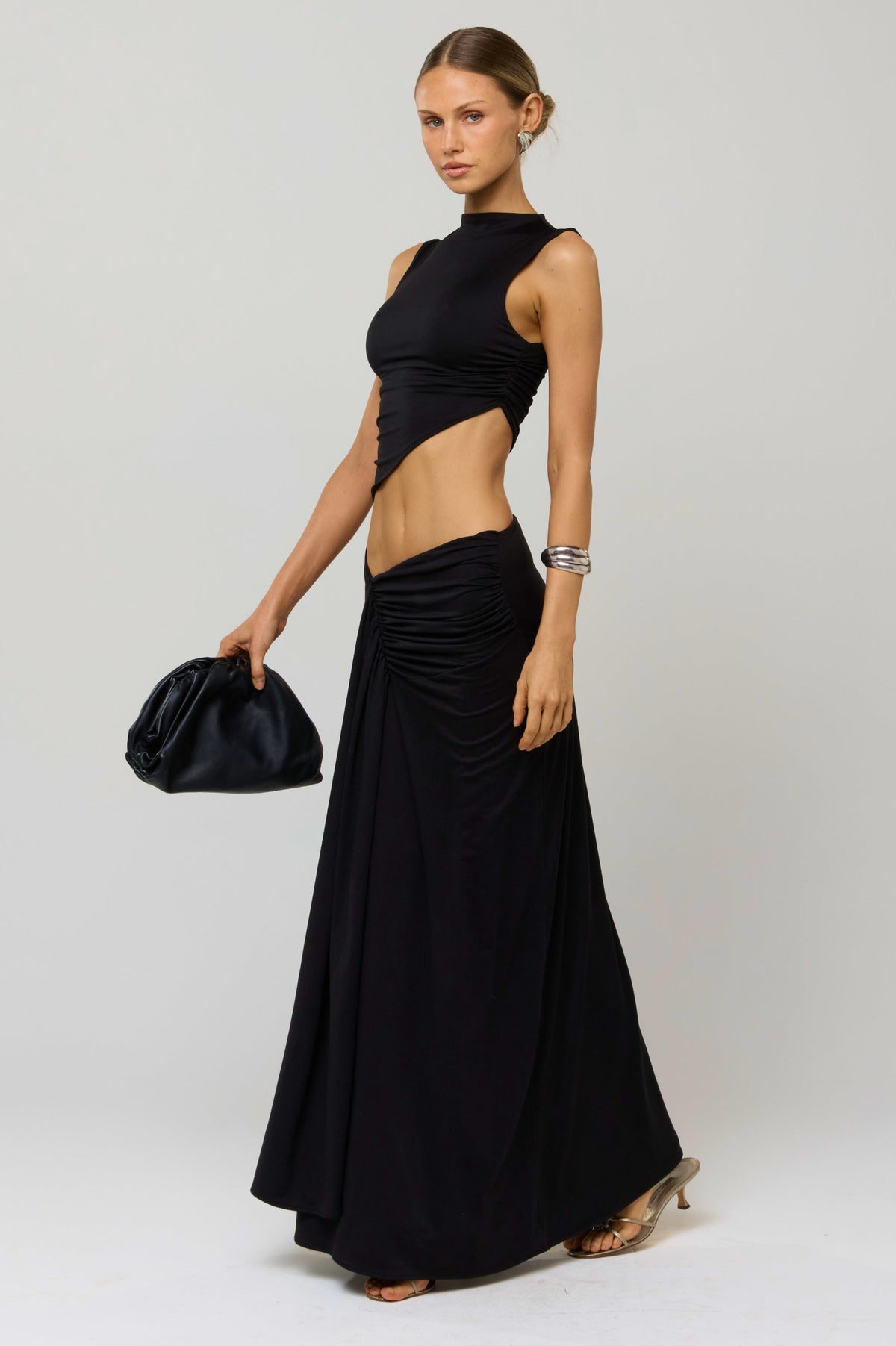 This is an image of Minka Top in Black Knit - RESA featuring a model wearing the dress