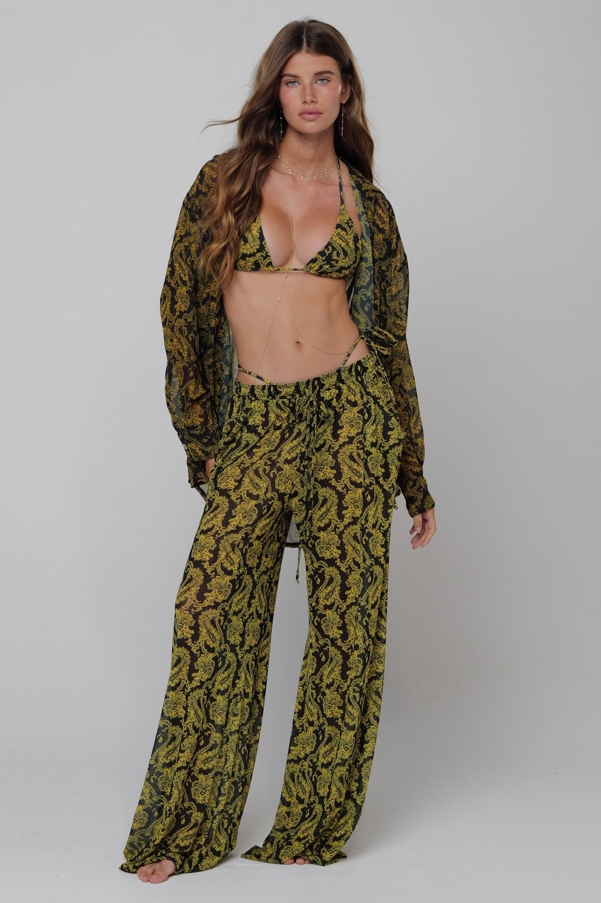 This is an image of Monica Chiffon Blouse in Sorrento - RESA featuring a model wearing the dress