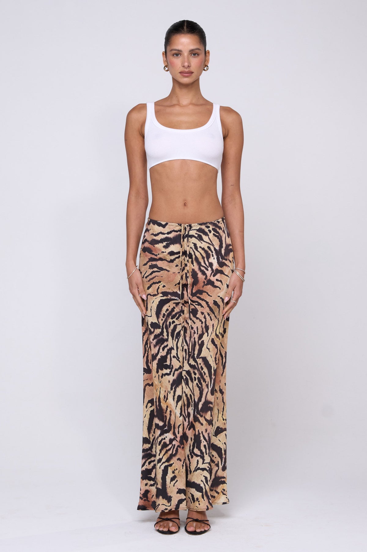 This is an image of OG Crop Tank in Ivory - RESA featuring a model wearing the dress