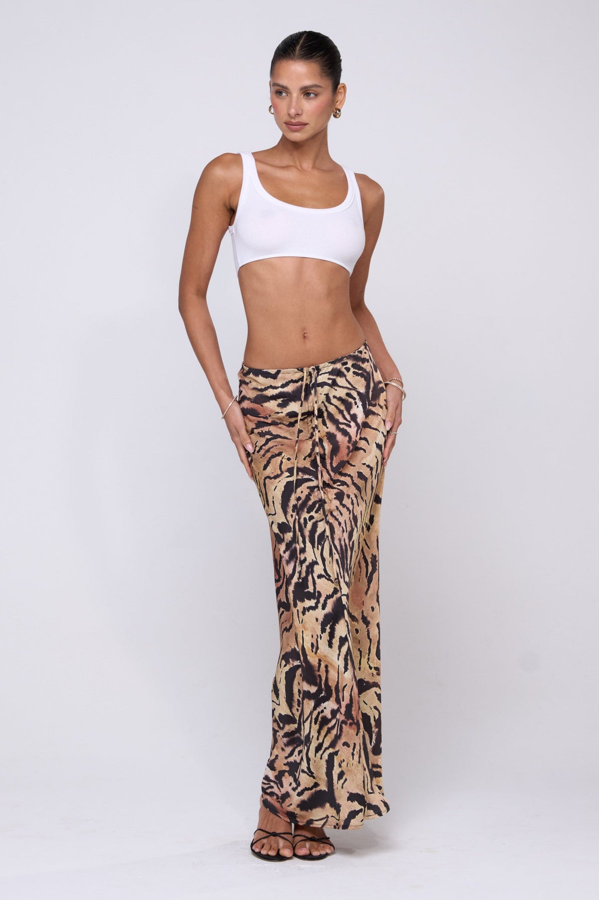 This is an image of OG Crop Tank in Ivory - RESA featuring a model wearing the dress
