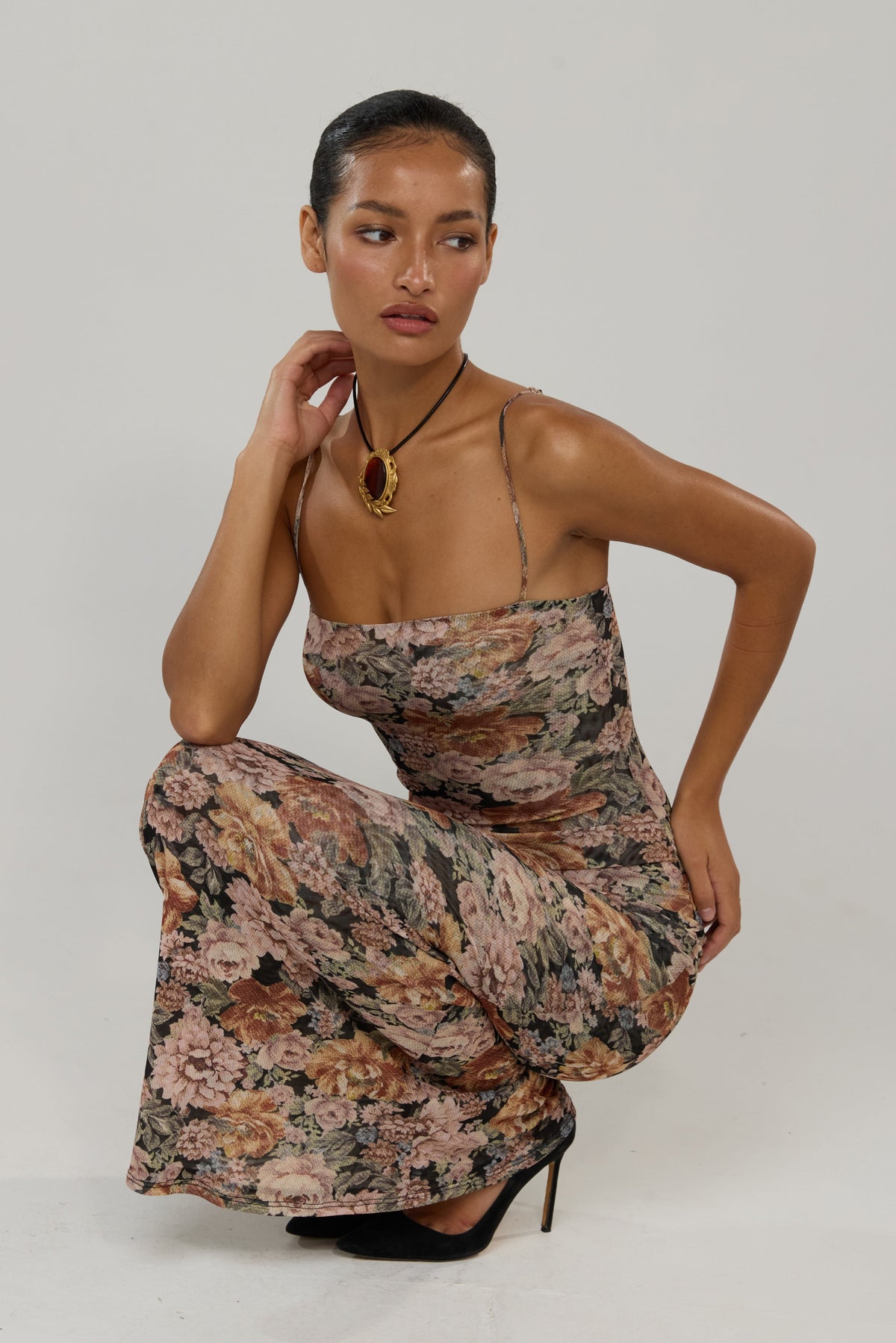 This is an image of Opal in Antique - RESA featuring a model wearing the dress