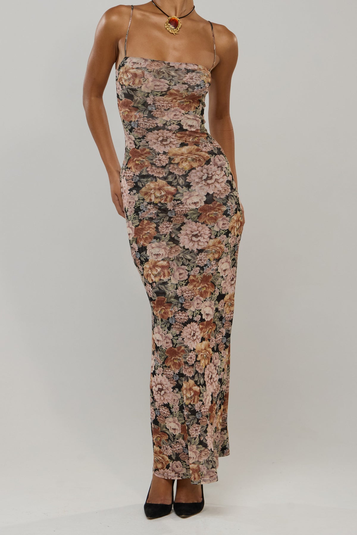 This is an image of Opal in Antique - RESA featuring a model wearing the dress