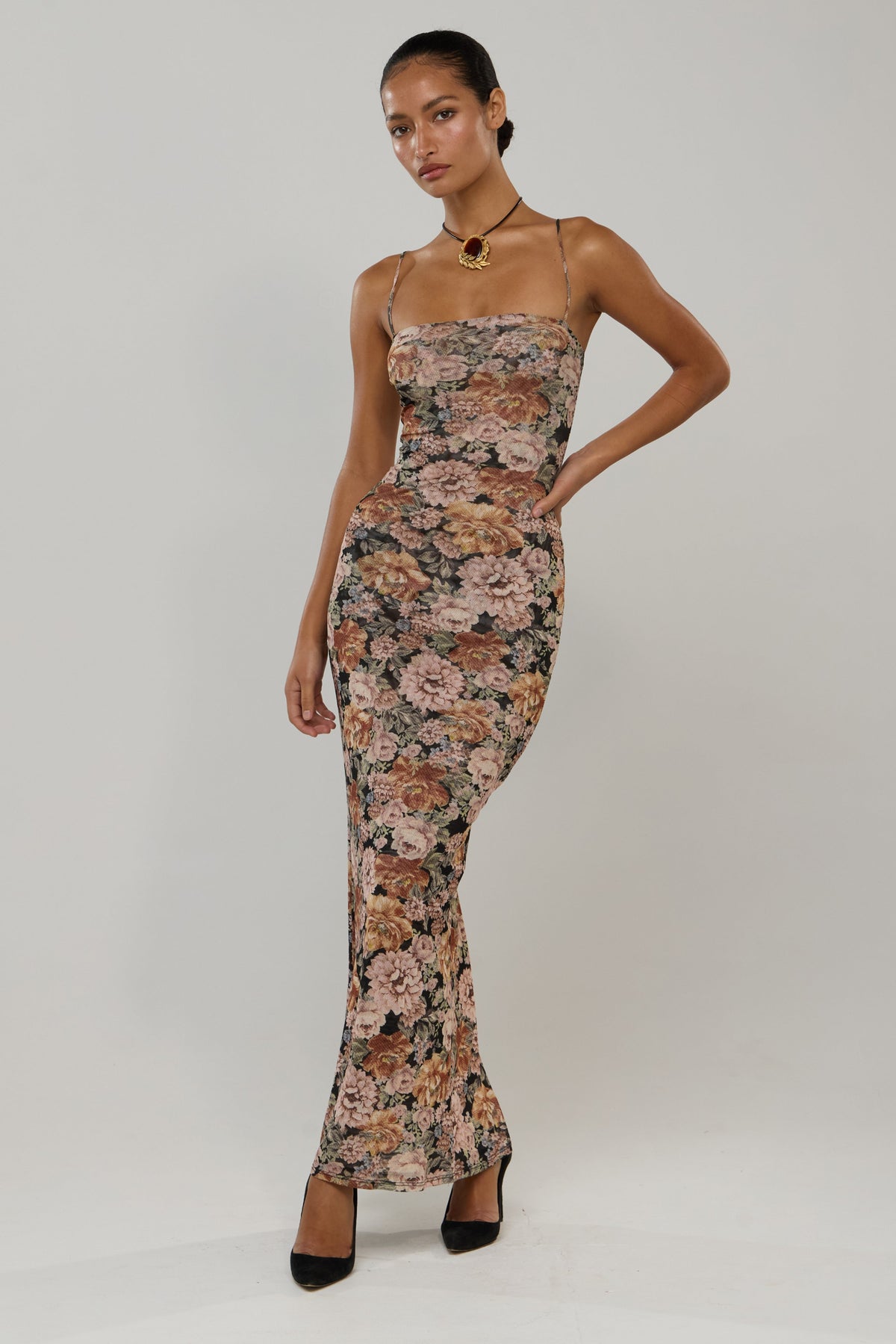 This is an image of Opal in Antique - RESA featuring a model wearing the dress