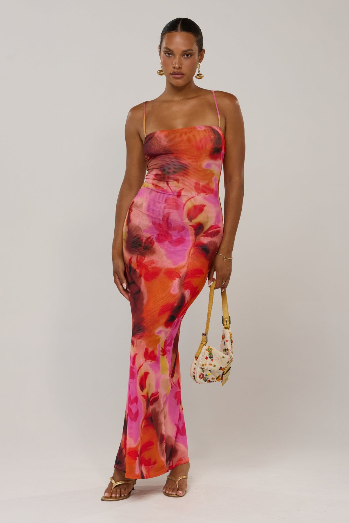 This is an image of Opal in Lilikoi - RESA featuring a model wearing the dress
