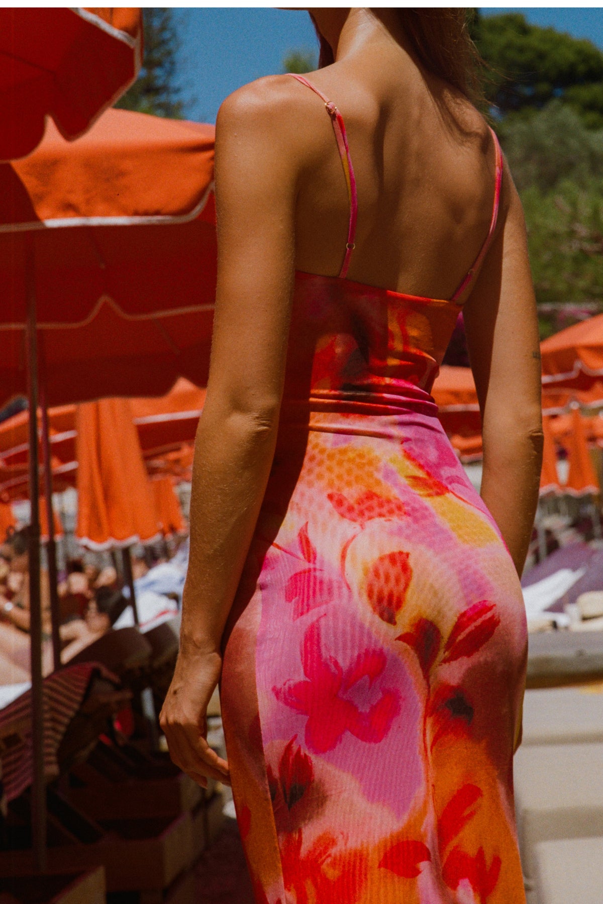 This is an image of Opal in Lilikoi - RESA featuring a model wearing the dress