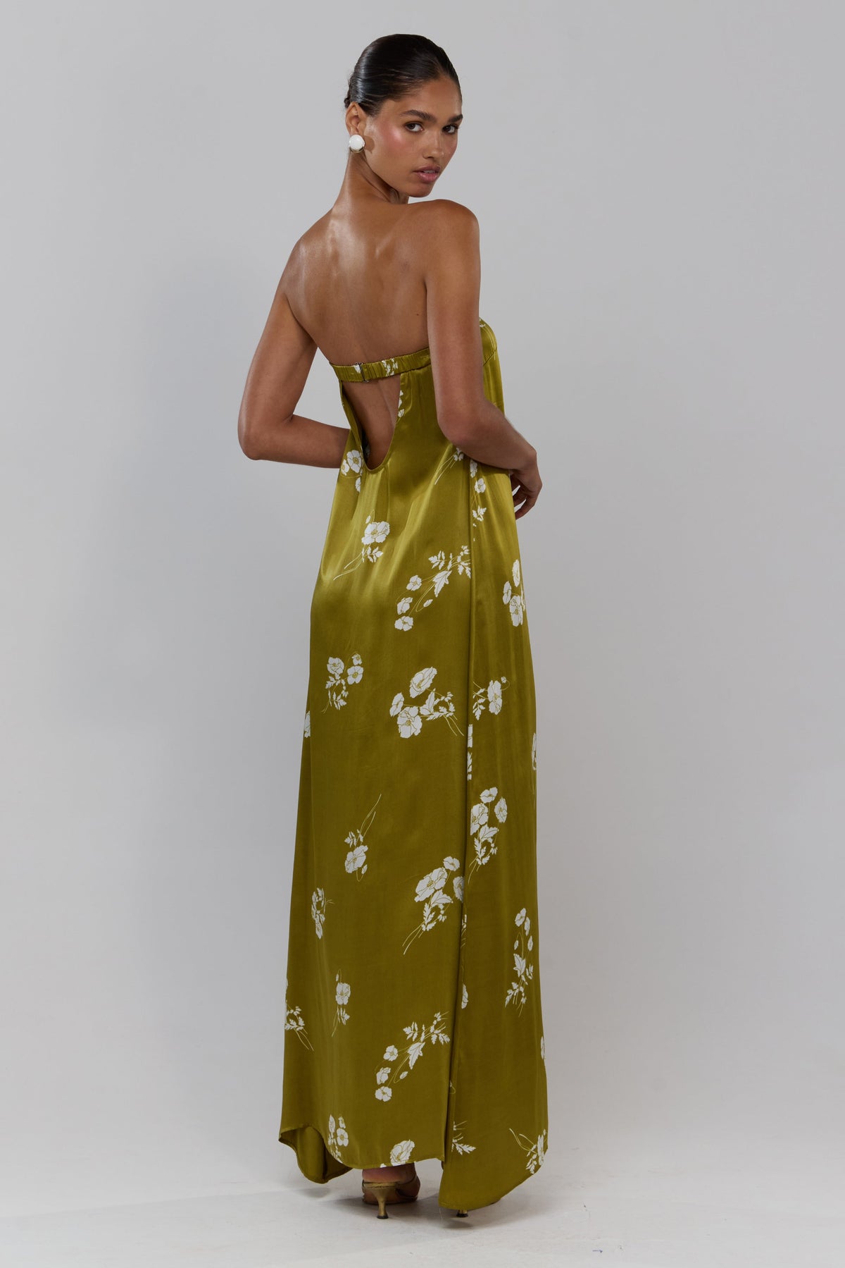 This is an image of Ophelia in Moss - RESA featuring a model wearing the dress