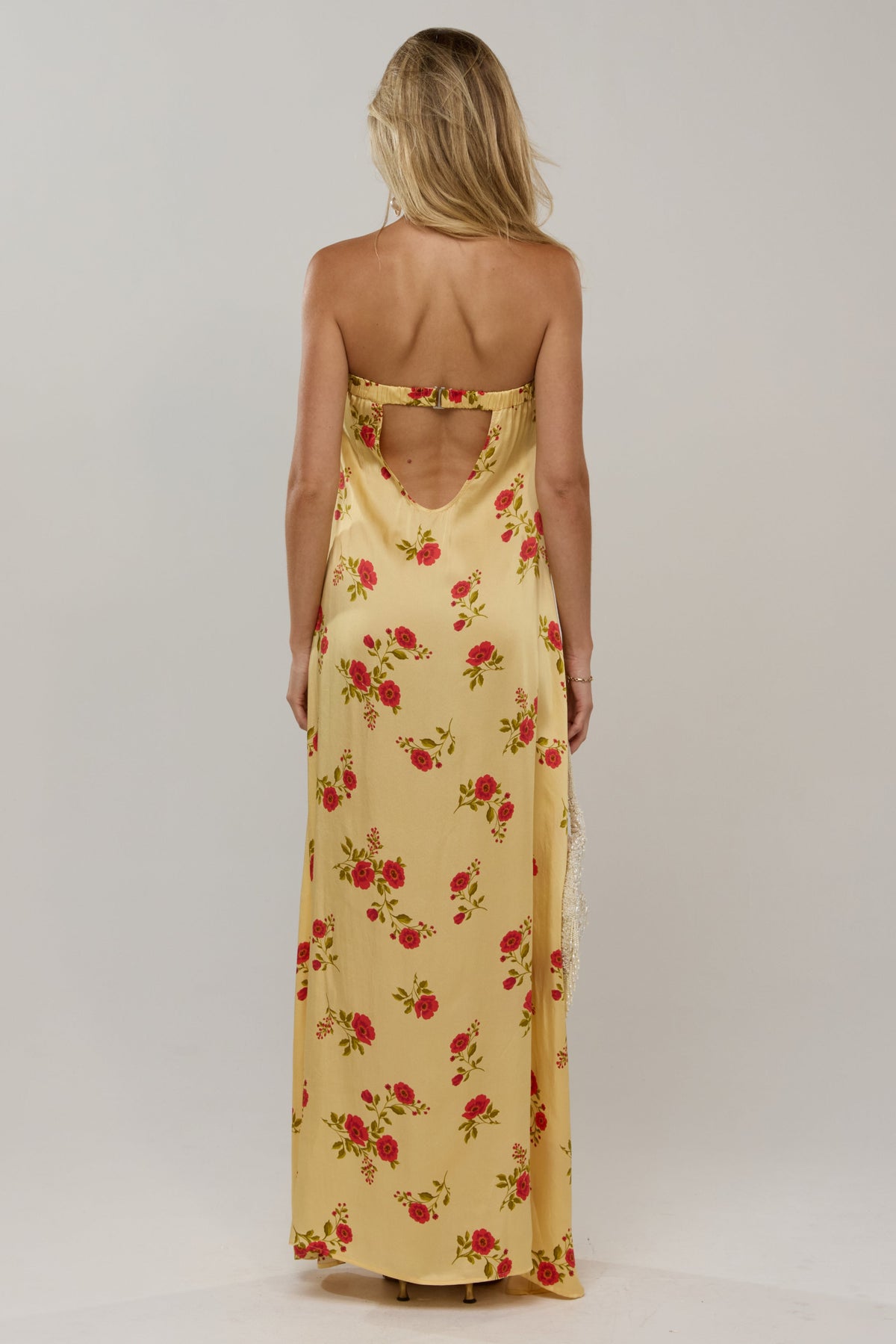 This is an image of Ophelia in Saffron - RESA featuring a model wearing the dress