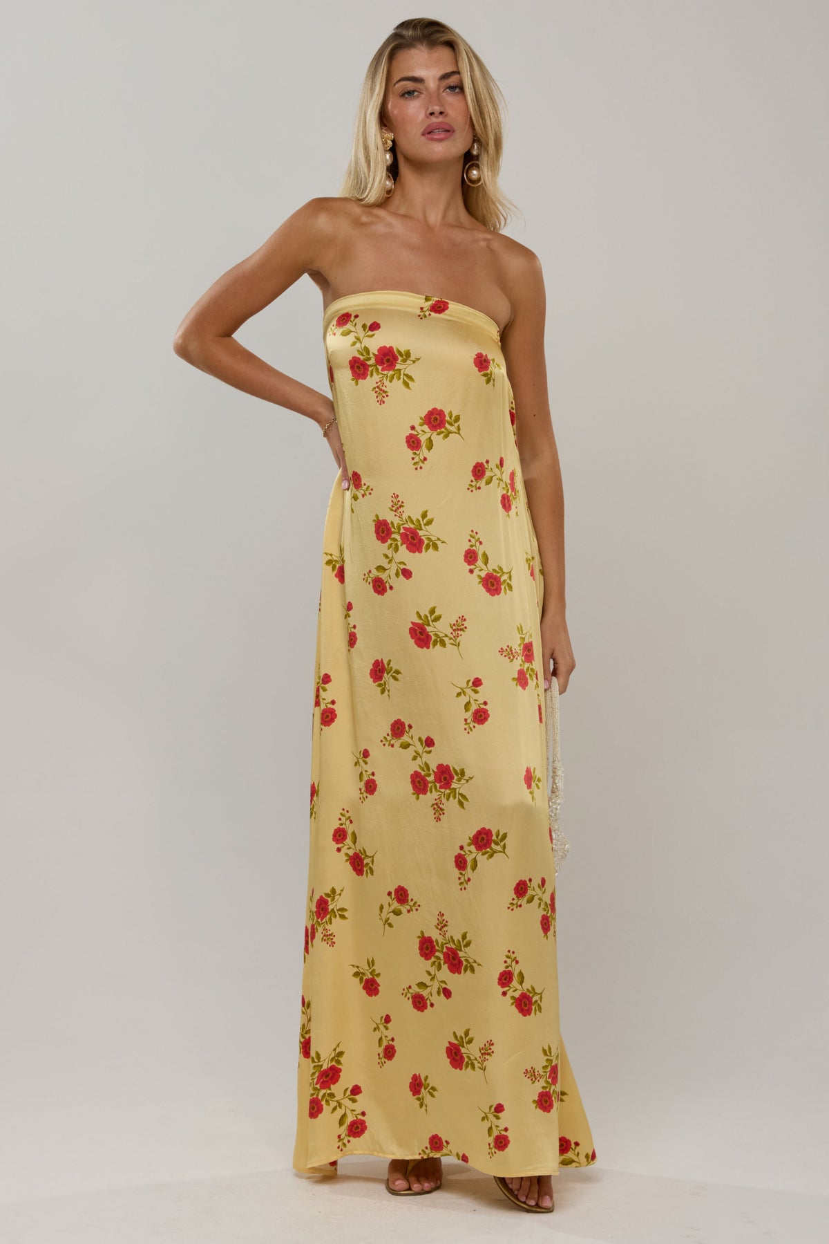 This is an image of Ophelia in Saffron - RESA featuring a model wearing the dress