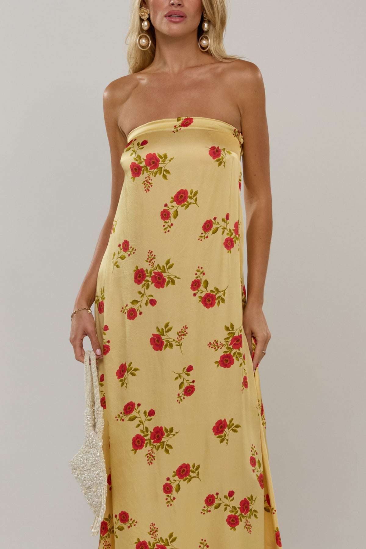 This is an image of Ophelia in Saffron - RESA featuring a model wearing the dress