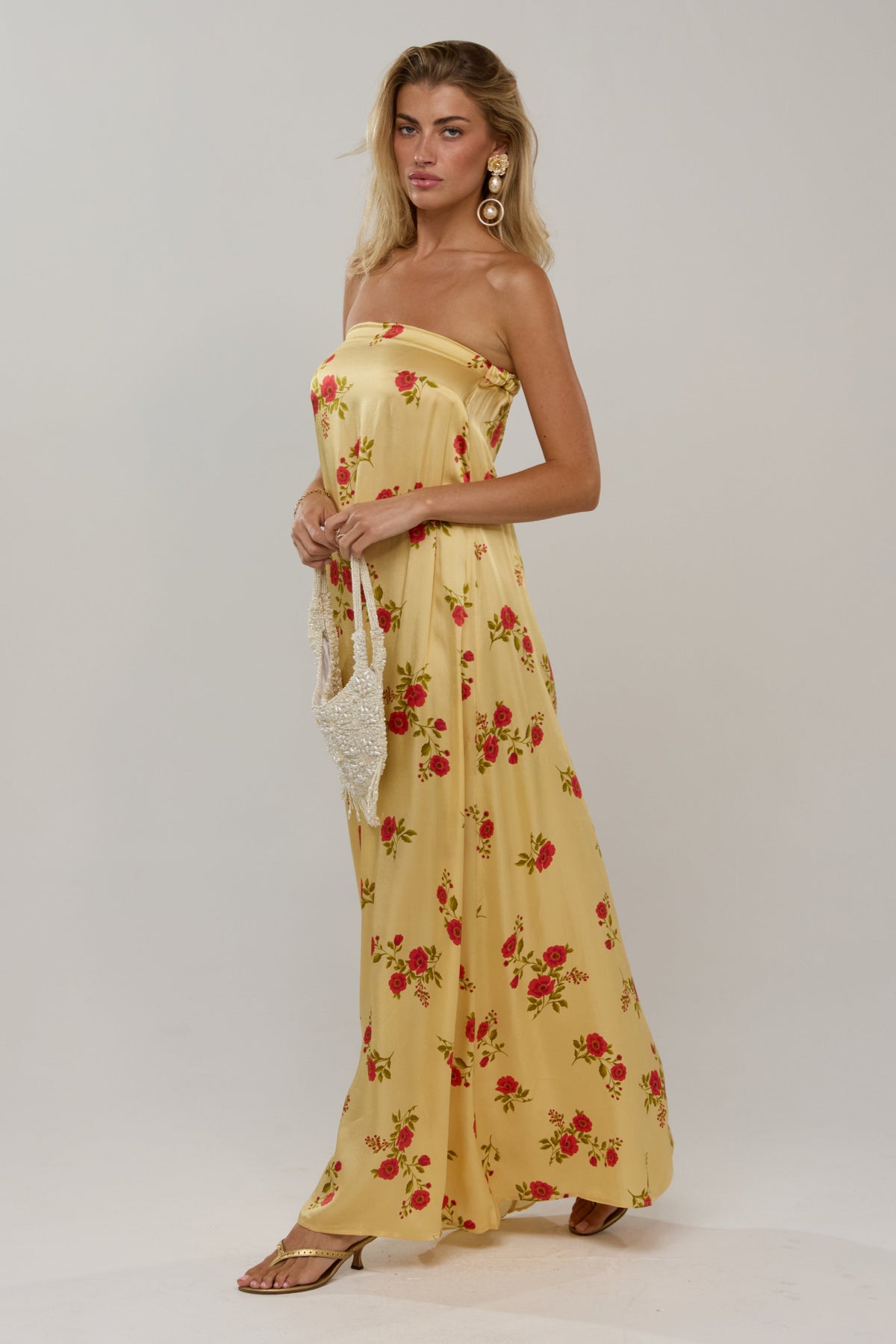 This is an image of Ophelia in Saffron - RESA featuring a model wearing the dress