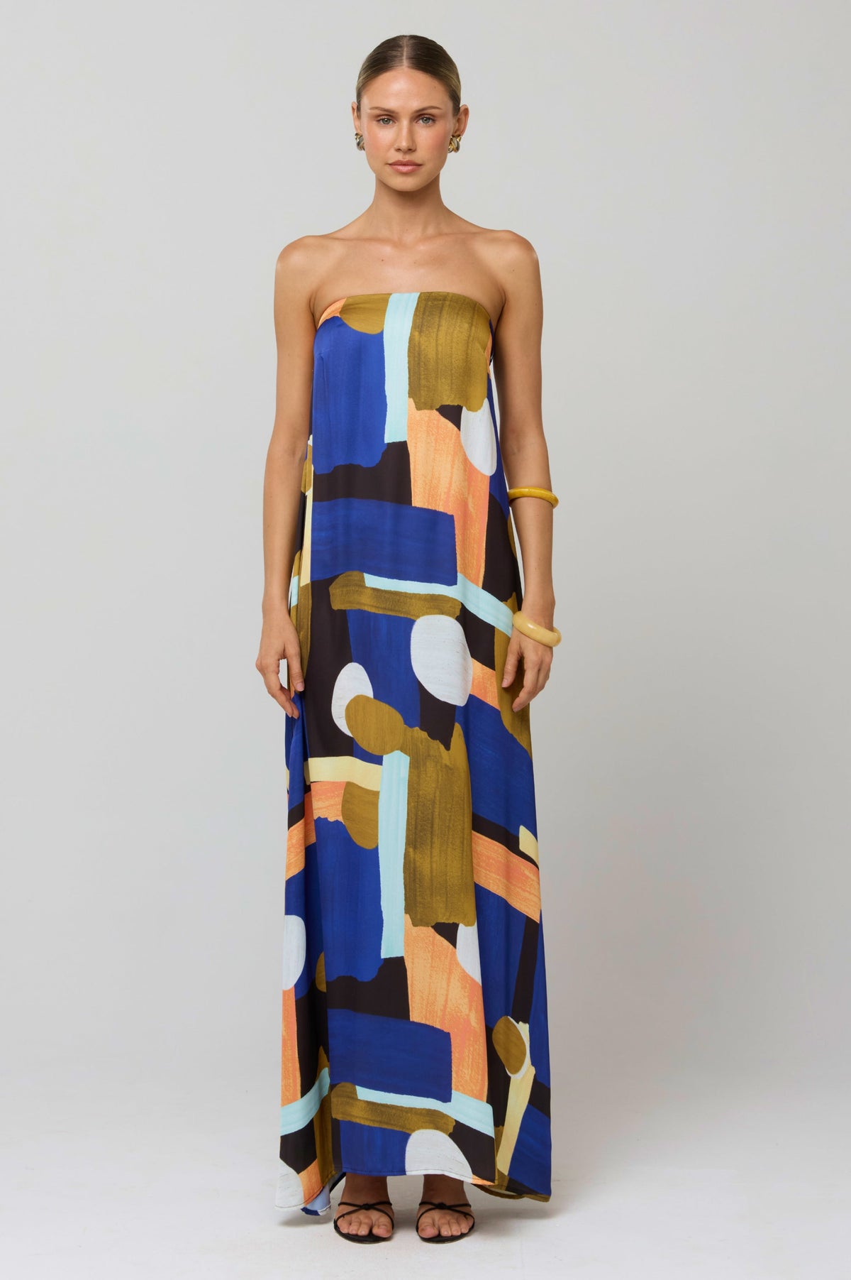 This is an image of Ophelia Maxi Dress in Deco - RESA featuring a model wearing the dress