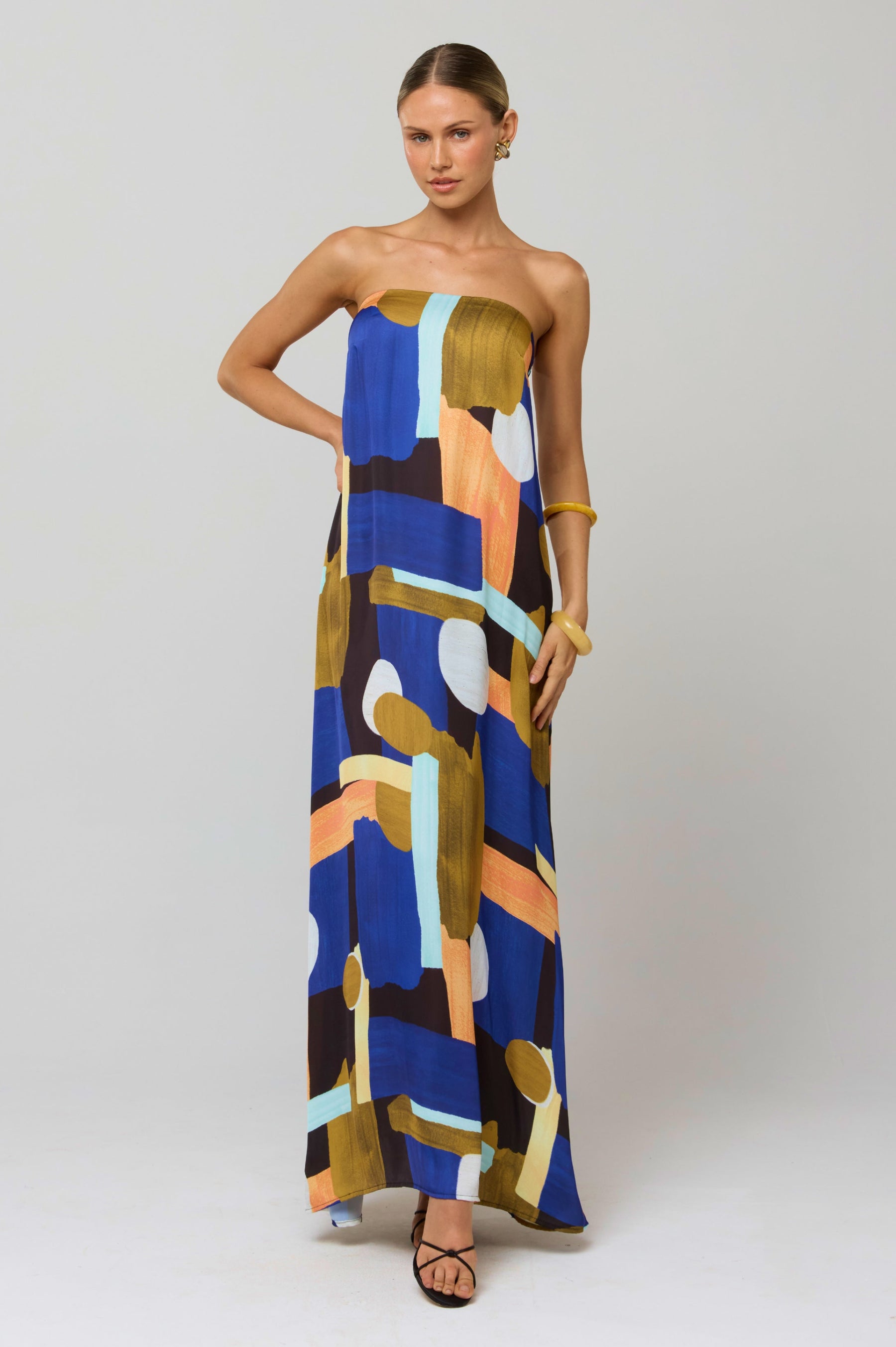 This is an image of Ophelia Maxi Dress in Deco - RESA featuring a model wearing the dress