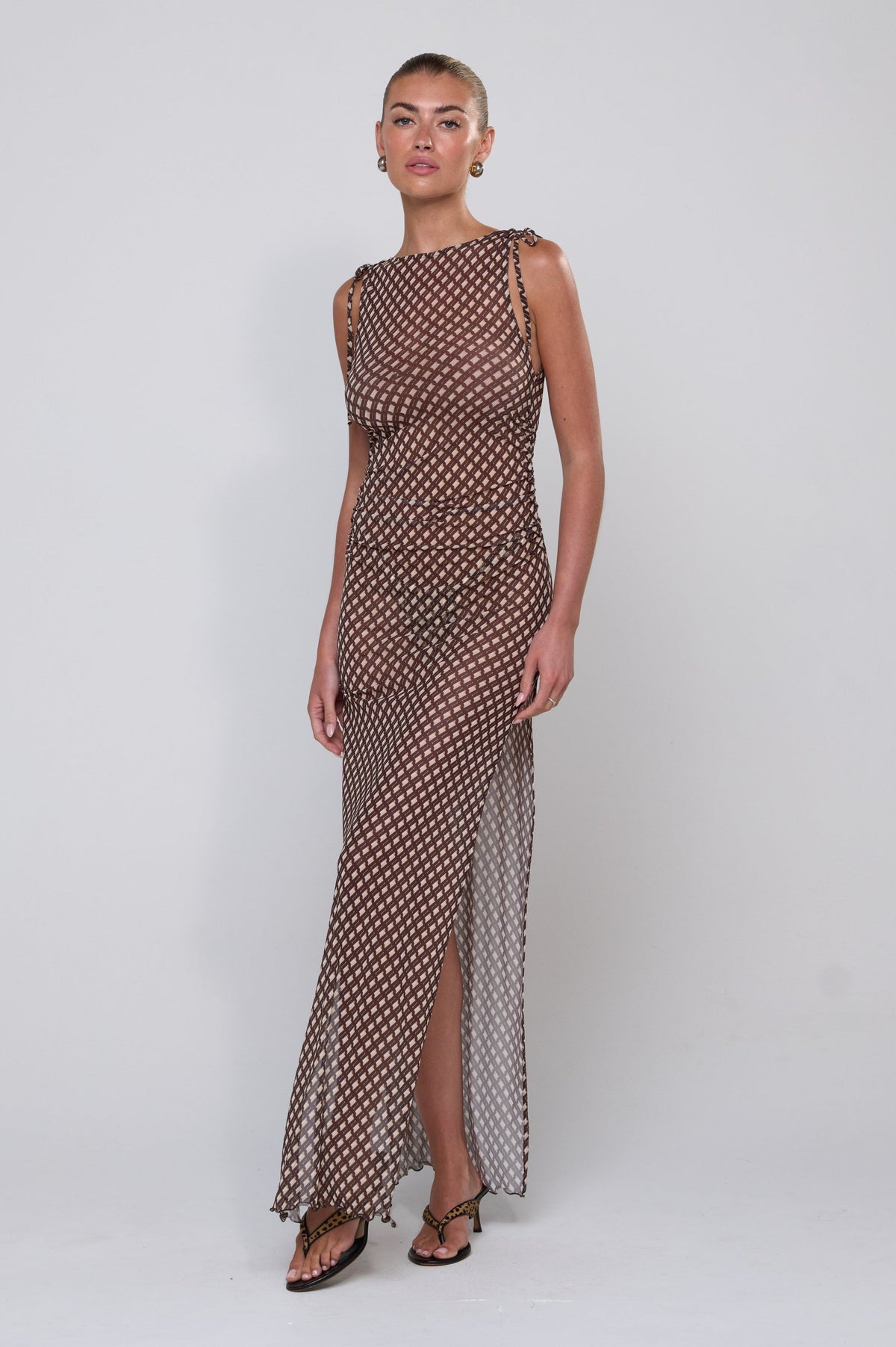 This is an image of Paige Dress in Tulum - RESA featuring a model wearing the dress