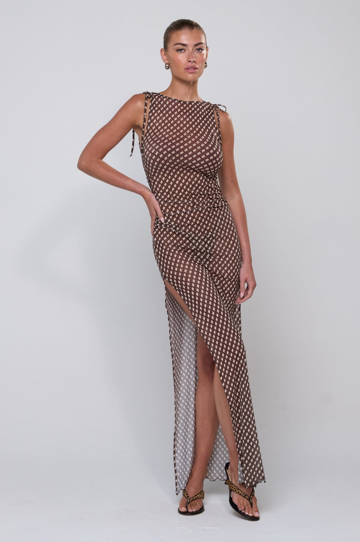 This is an image of Paige Dress in Tulum - RESA featuring a model wearing the dress