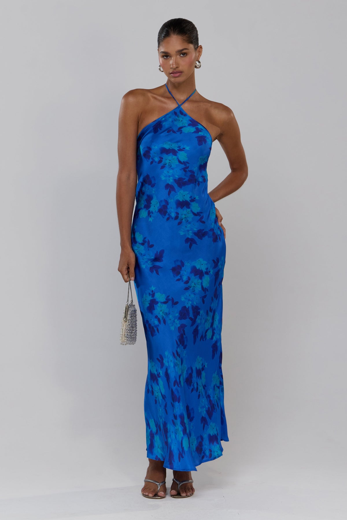 This is an image of Pam in Azul - RESA featuring a model wearing the dress