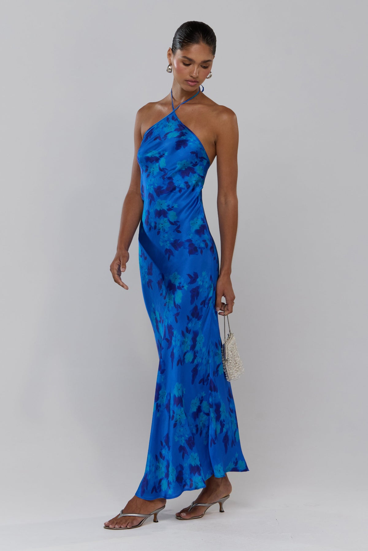 This is an image of Pam in Azul - RESA featuring a model wearing the dress