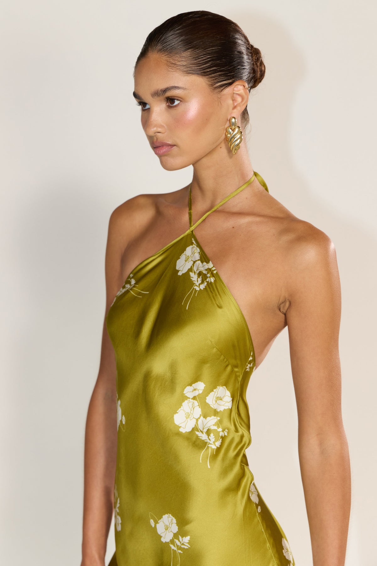 This is an image of Pam in Moss - RESA featuring a model wearing the dress