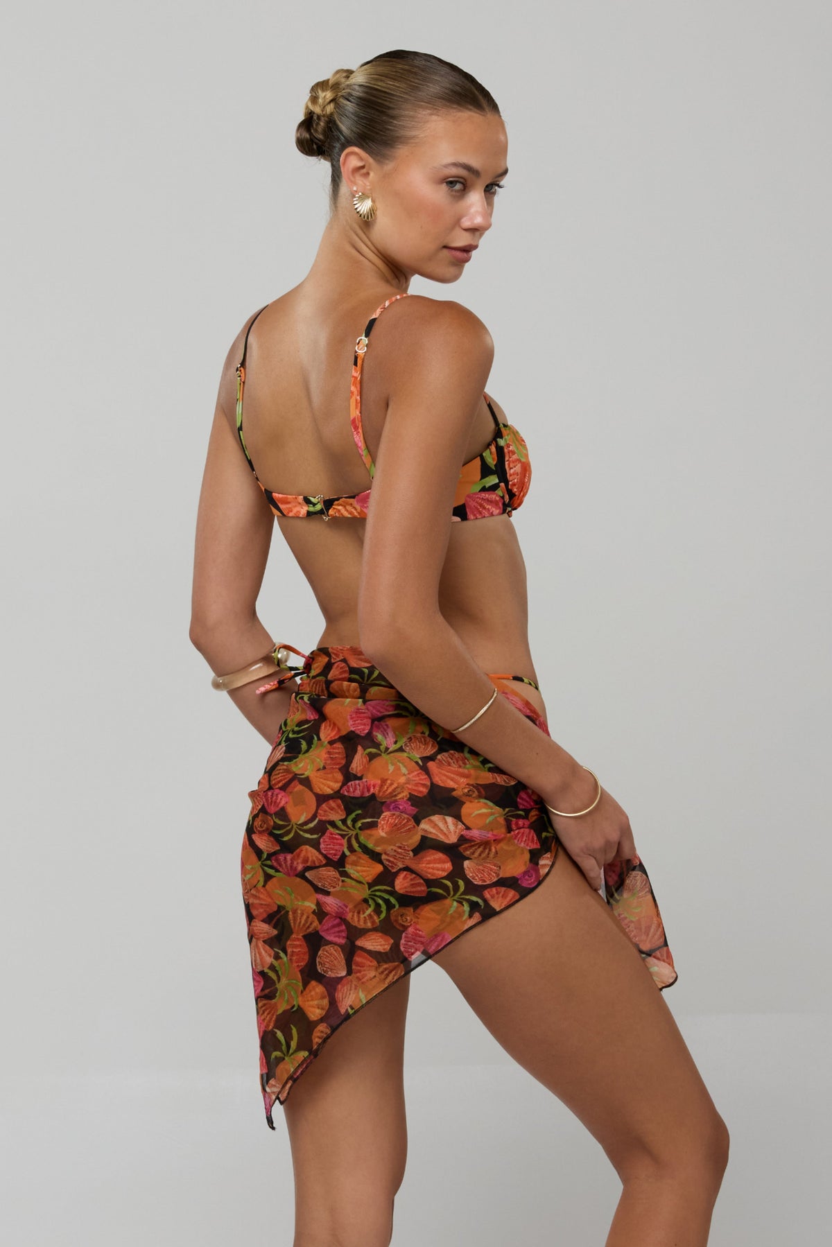 This is an image of Perfect Scarf Top and Sarong in Conch - RESA featuring a model wearing the dress