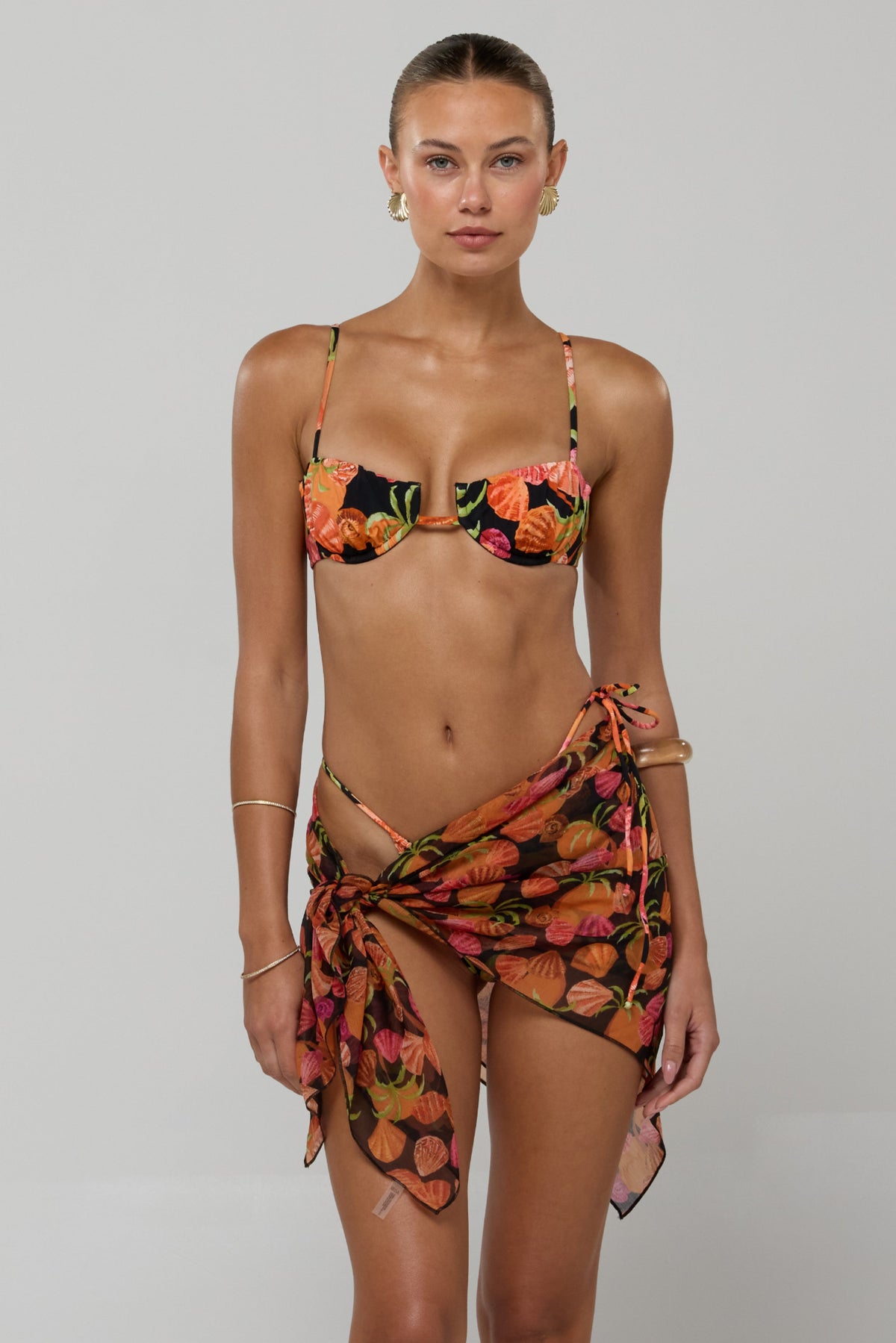 This is an image of Perfect Scarf Top and Sarong in Conch - RESA featuring a model wearing the dress
