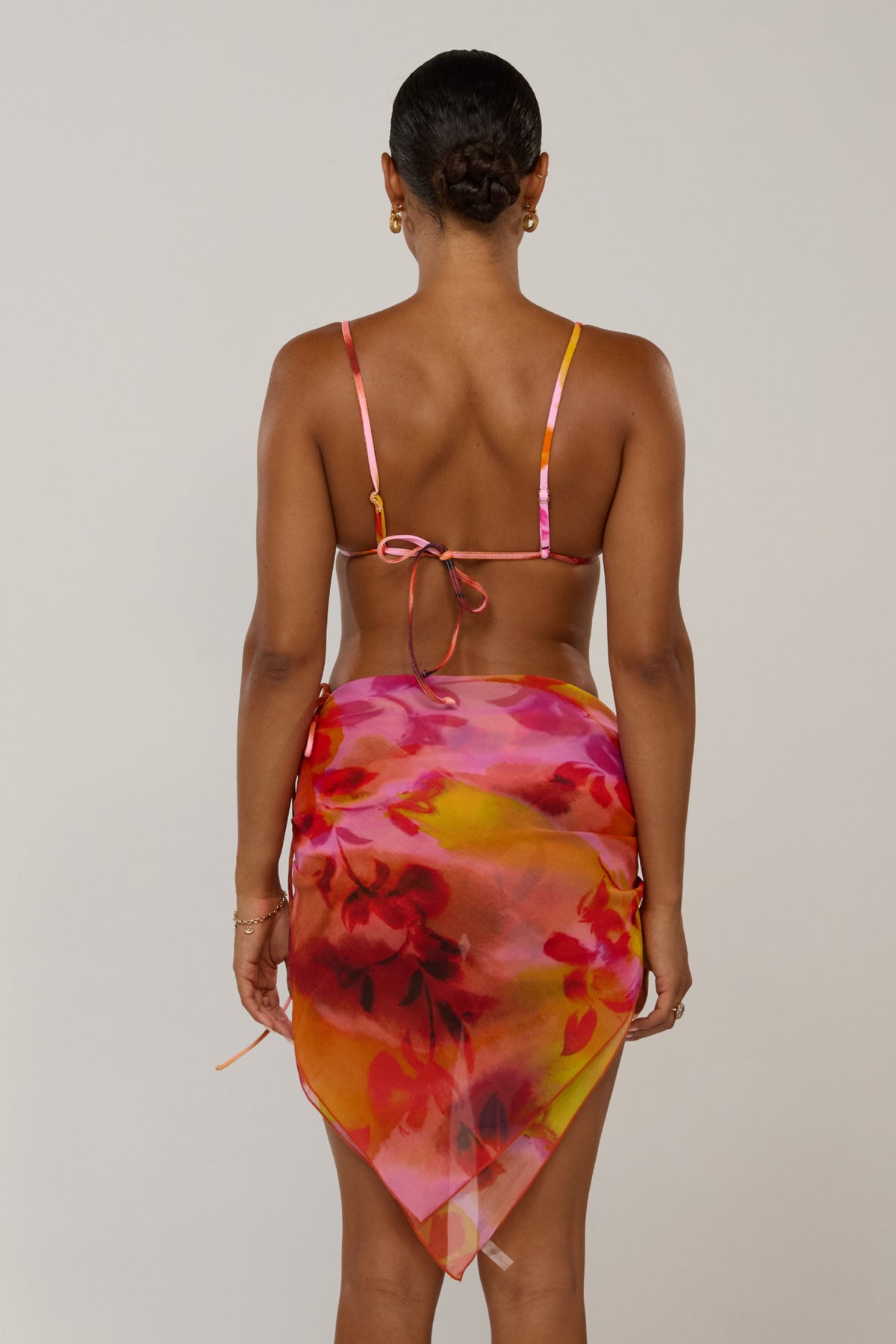 This is an image of Perfect Scarf Top in Lilikoi - RESA featuring a model wearing the dress