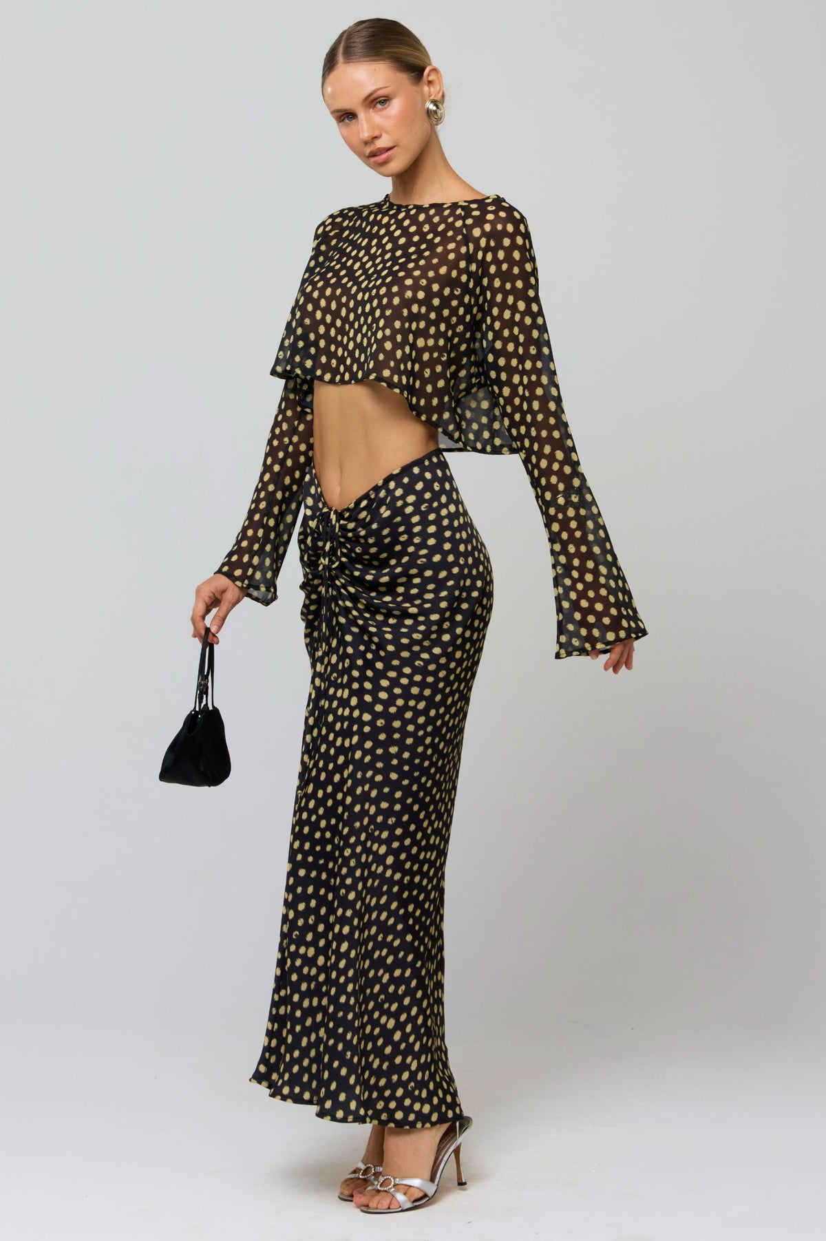 This is an image of Piper Crop Top in Celeste - RESA featuring a model wearing the dress