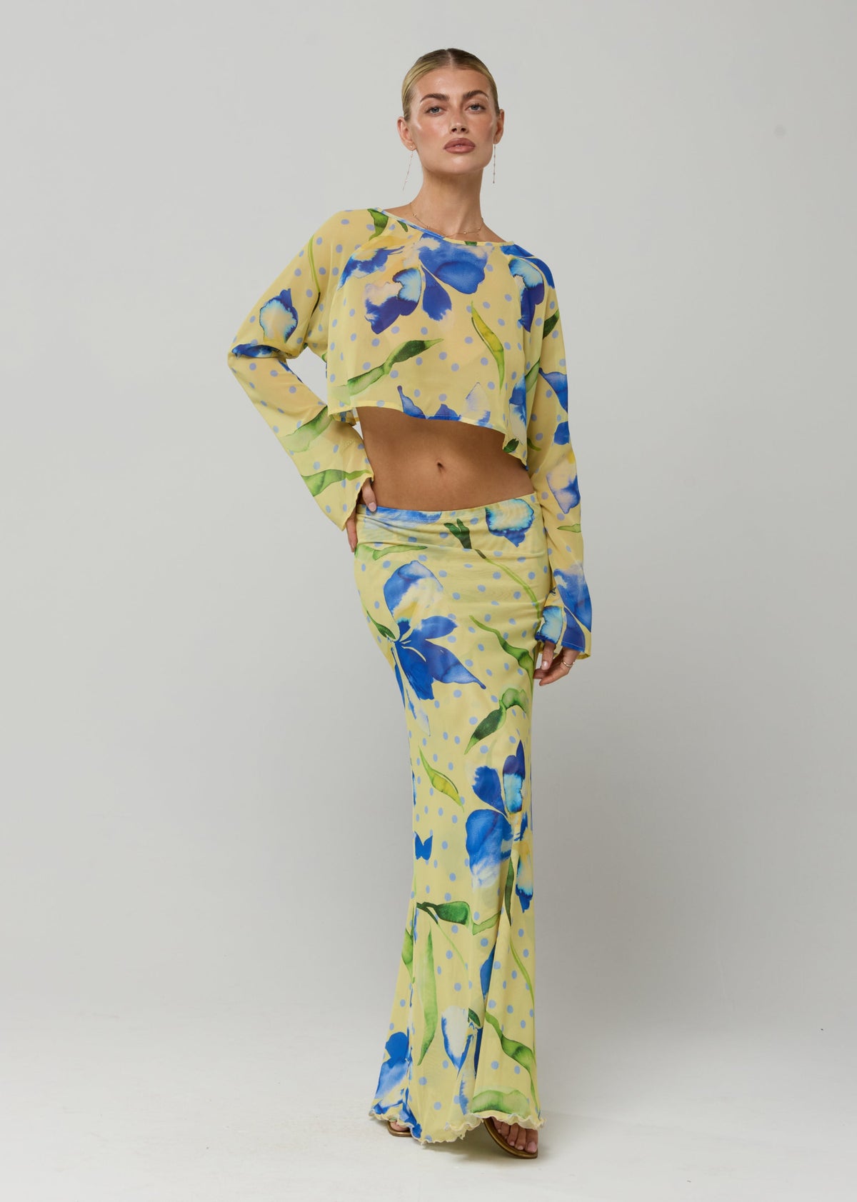 This is an image of Piper Crop Top in Solei - RESA featuring a model wearing the dress