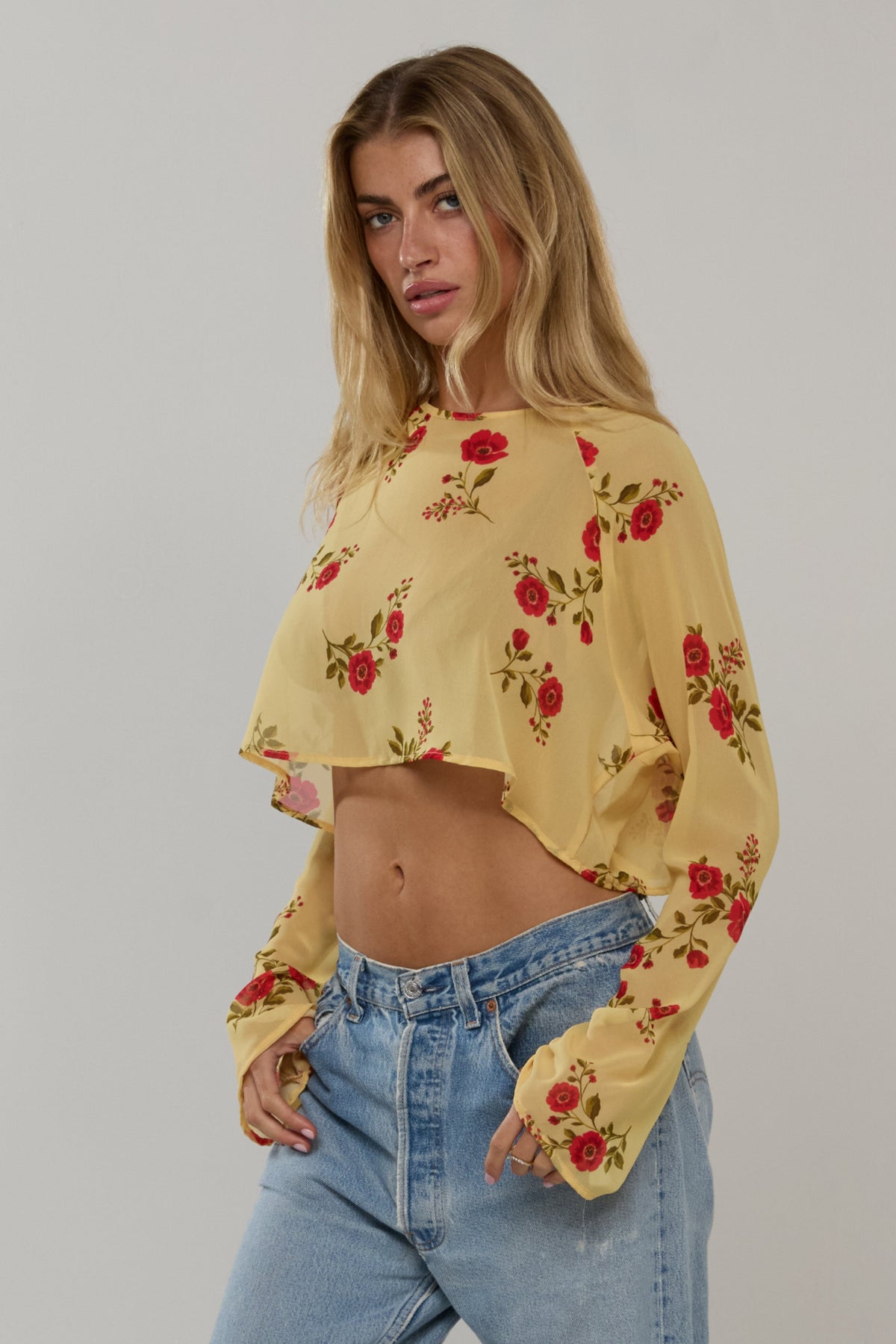 This is an image of Piper in Saffron - RESA featuring a model wearing the dress