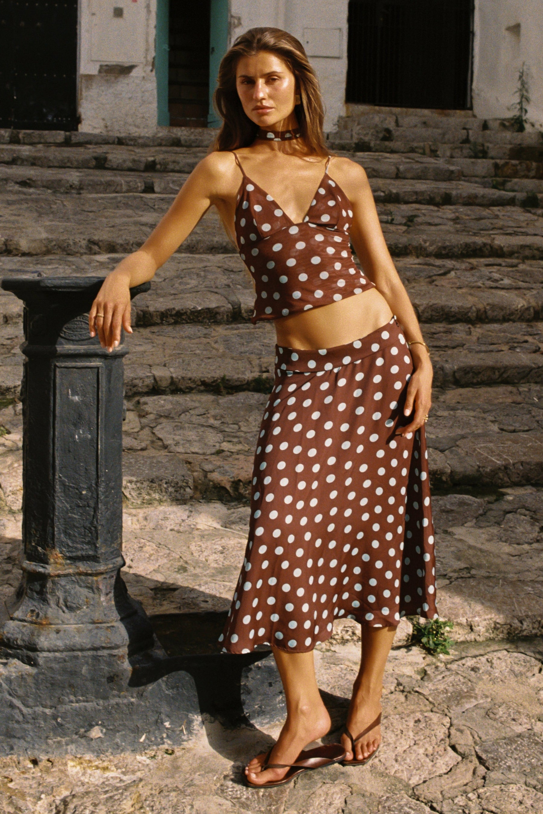 This is an image of Raven in Costa - RESA featuring a model wearing the dress