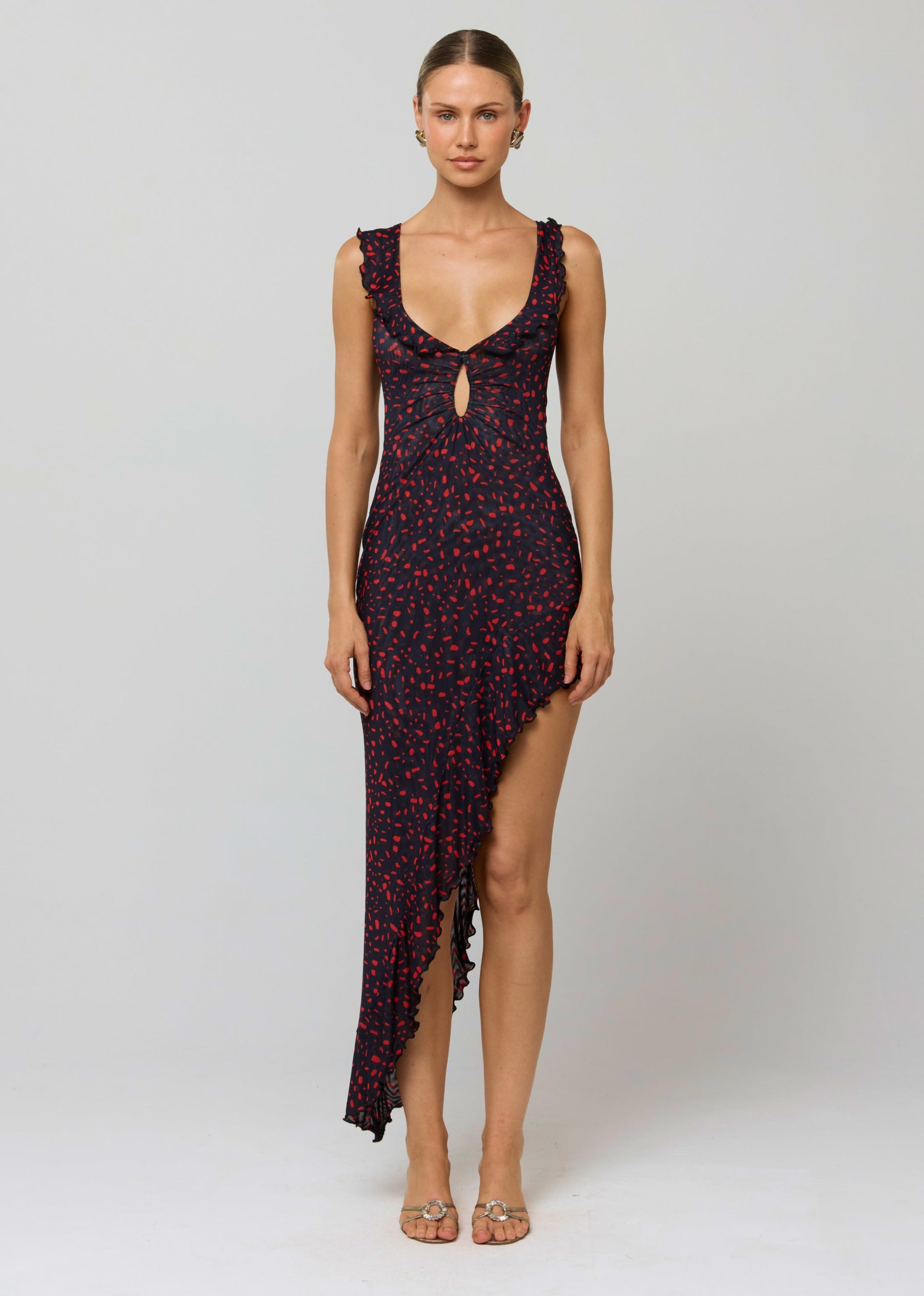 This is an image of Rhonda Dress in Rouge - RESA featuring a model wearing the dress