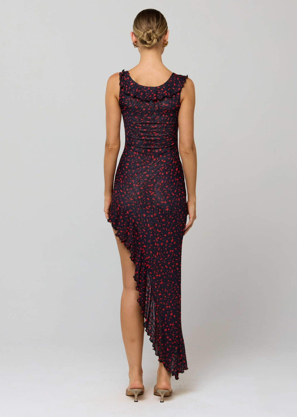 This is an image of Rhonda Dress in Rouge - RESA featuring a model wearing the dress