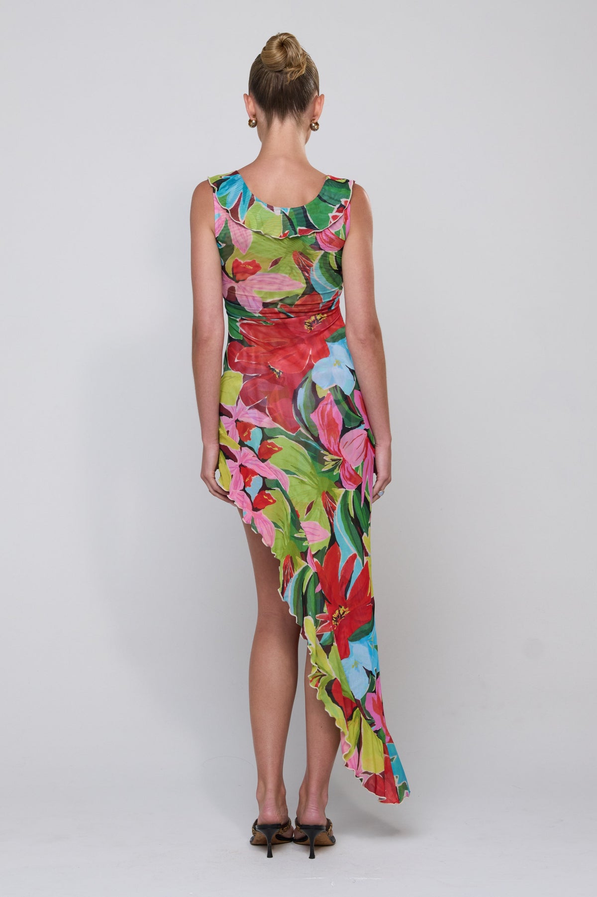 This is an image of Rhonda Dress in Tropicana - RESA featuring a model wearing the dress