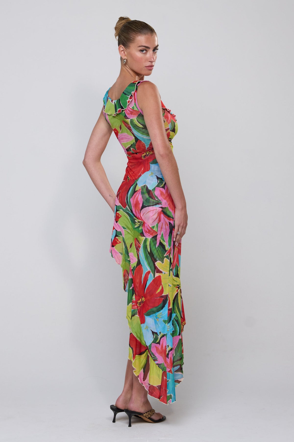 This is an image of Rhonda Dress in Tropicana - RESA featuring a model wearing the dress